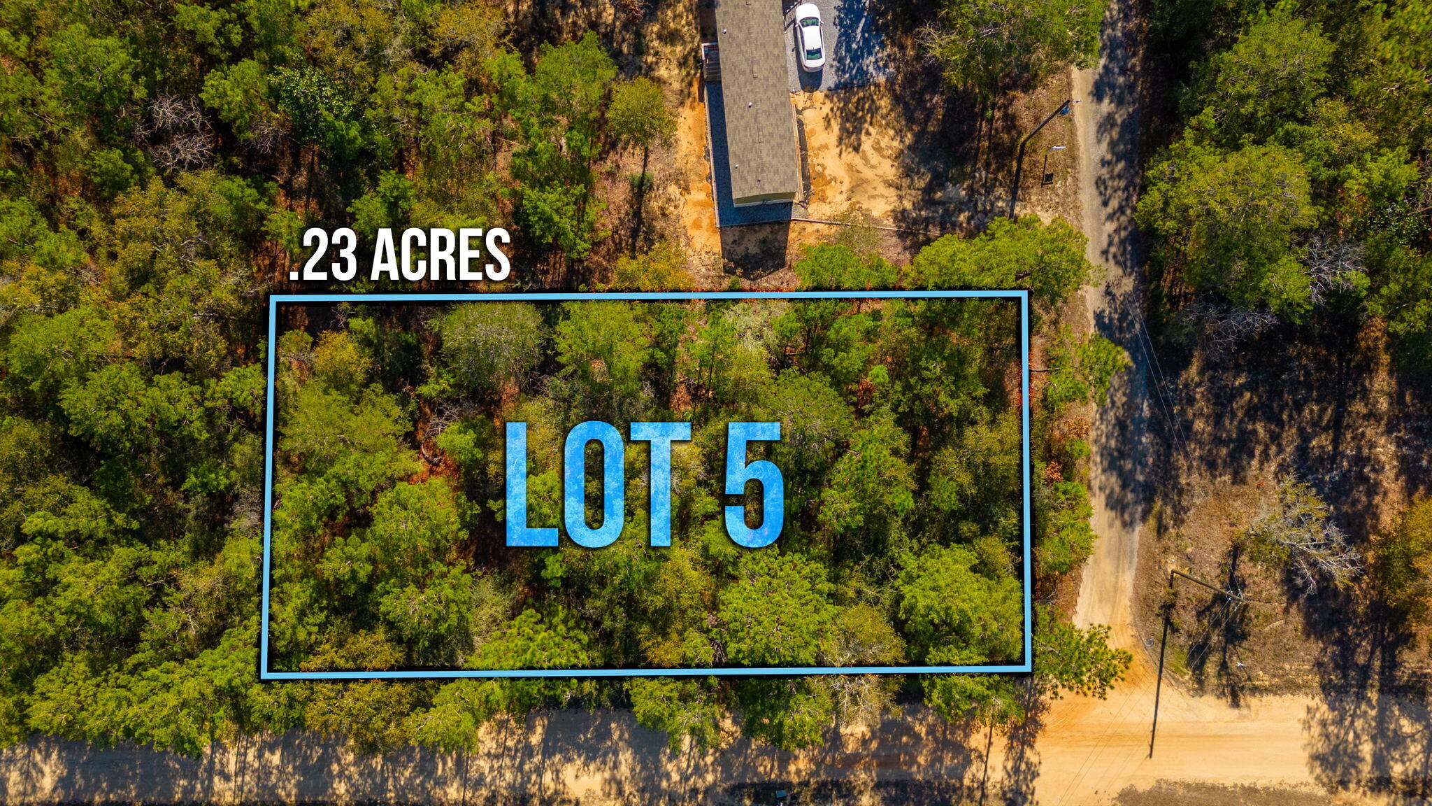 Unleash your dream home's potential on this .23-acre lot in Oakwood Hills Unit 3. No restrictions mean limitless possibilities against a wooded backdrop. Level, flood and wetland-free, this canvas invites manufactured homes. Despite lacking utilities, power and water are at the street. A tap fee awaits and a septic tank is needed. Accessible 500 ft from a paved road on a county-maintained road. Just 2 blocks off of Hwy 90, this unrestricted haven offers serenity with the promise of convenience. Seize this chance to define your sanctuary. Adjacent lot is also available for purchase.