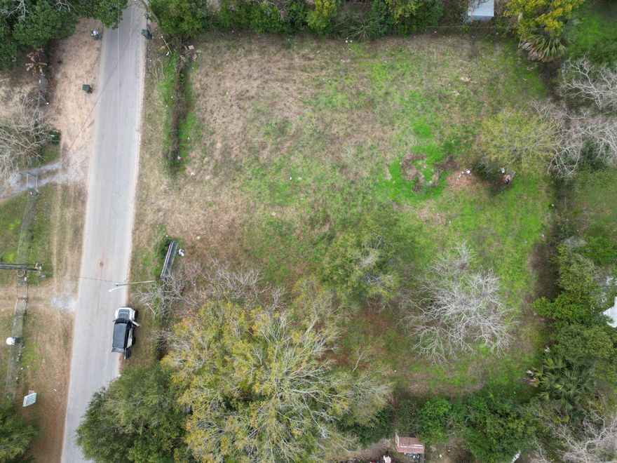 .1591  acre residential lot zoned HC/LI According to GIS map not in Flood Zone (X) , no wetlands, see photos for other pertinent information . ECUA has water, sanitation, and public sewer at lot. tap in fee is due. THERE ARE 3 LOTS side by side (mls # 991590 and #991594) available and listed separate