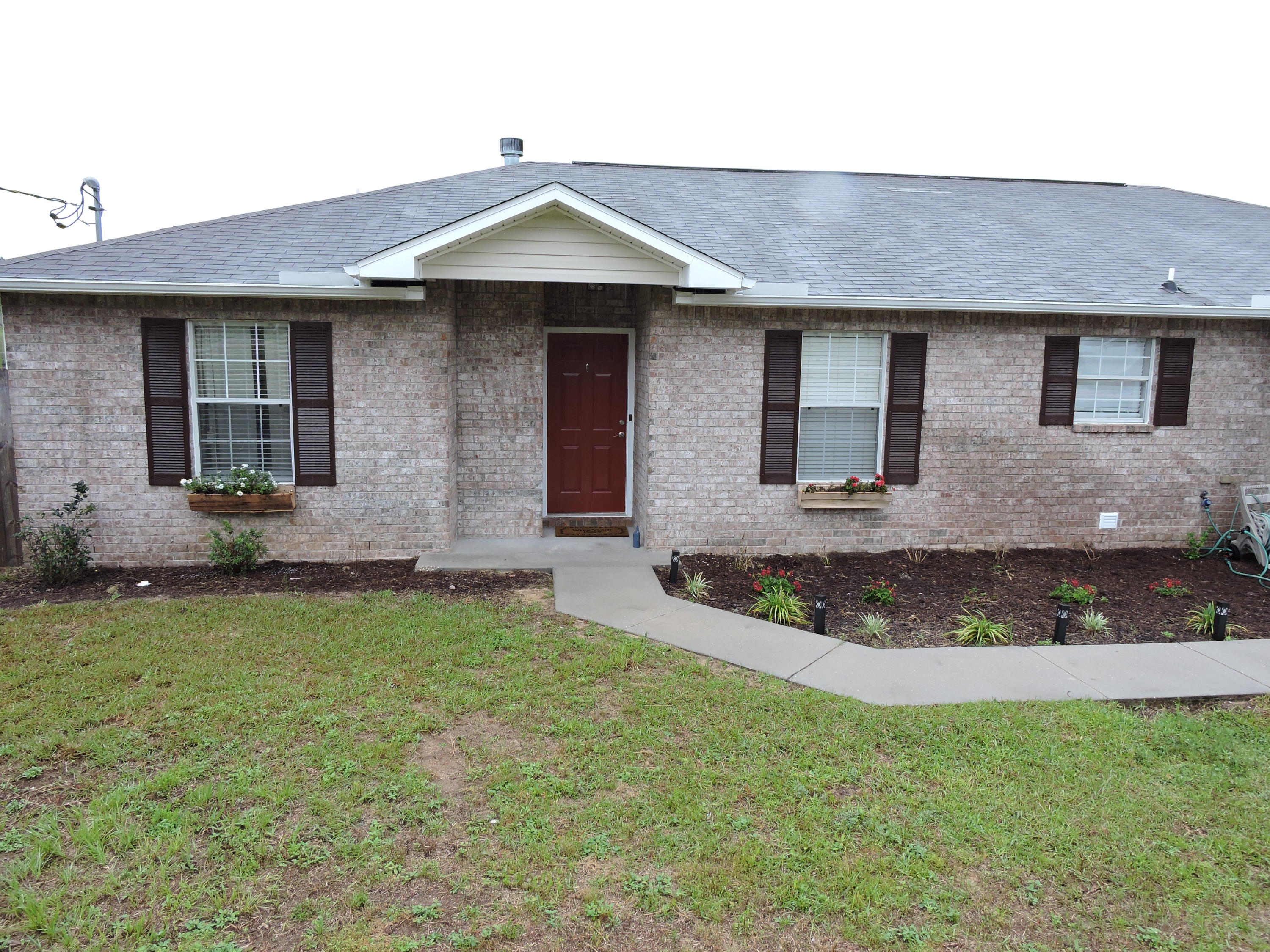 Come view this well maintained 3bed/2bath home where ''Pride of Ownership'' speaks for itself. Located South of I-10 in the sought after neighborhood of Countryview Estates. This beautiful home features new wood look tile floors thoughout the main living area/kitchen/hallways. The galley style kitchen features stainless steel appliances, new light fixtures, white cabinets with crown moulding, and a herringbone design in the tile floors. The large family room is accented with a wood burning fireplace and cathedral ceilings. Thelarge master suite features in carpeting, his/her closets and dual vanities in the master bath with new light fixtures, mirrors, and bronze plumbing fixtures. The additional bedrooms feature new carpeting, nice sized closets with a well appointed hall bath