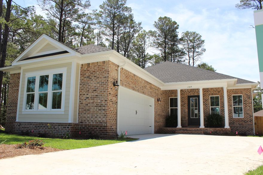 Quality, Craftsman style 4 bedroom, 2 full bath home, built by an experienced, local builder, in Niceville's newest community, DEER MOSS CREEK, Ph 1 the Hartfield . Open floor plan. Wood tile through out main living areas. Tile in the wet areas and carpet in the bedrooms. Solid wood, soft close, shaker style cabinets and granite counter tops . Gas range w/ hood vent. Microwave and oven wall unit. Rannai tankless hot water heater. GE stainless slate appliances. Large utility room with cabinets. 4th bedroom could be used for an office. All brick home with front and back porches.Fenced back yard. This Is a 2019 BIA Parade of Homes. Zoned A+ schools, minutes to Eglin AFB, Duke Field 7th Special Forces and close to Destin's gorgeous beaches.
