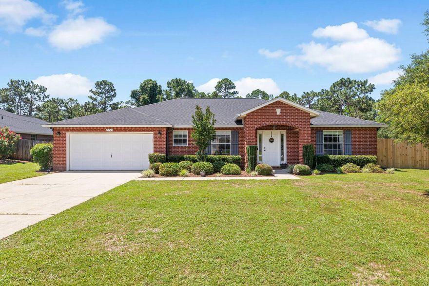 Welcome to this beautiful 3 bedroom, 2 bathroom ranch-style home in the coveted Holley by the Sea community. Fall in love with the open split bedroom floor plan, and a versatile fourth room (with a closet and window) that can serve as an office or extra bedroom. Natural light floods each space creating a welcoming atmosphere. The kitchen is equipped with granite countertops, fingerprint-resistant black slate appliances, and plenty of cabinet space. You'll equally be able to enjoy the private fenced-in backyard, with a screened in patio and new shed, perfect for outdoor activities and storage. This home also features a 2019 roof, a 2020 water heater, and a 2022 HVAC system. Additionally, the lot behind the property is a conservation parcel, providing extra privacy.