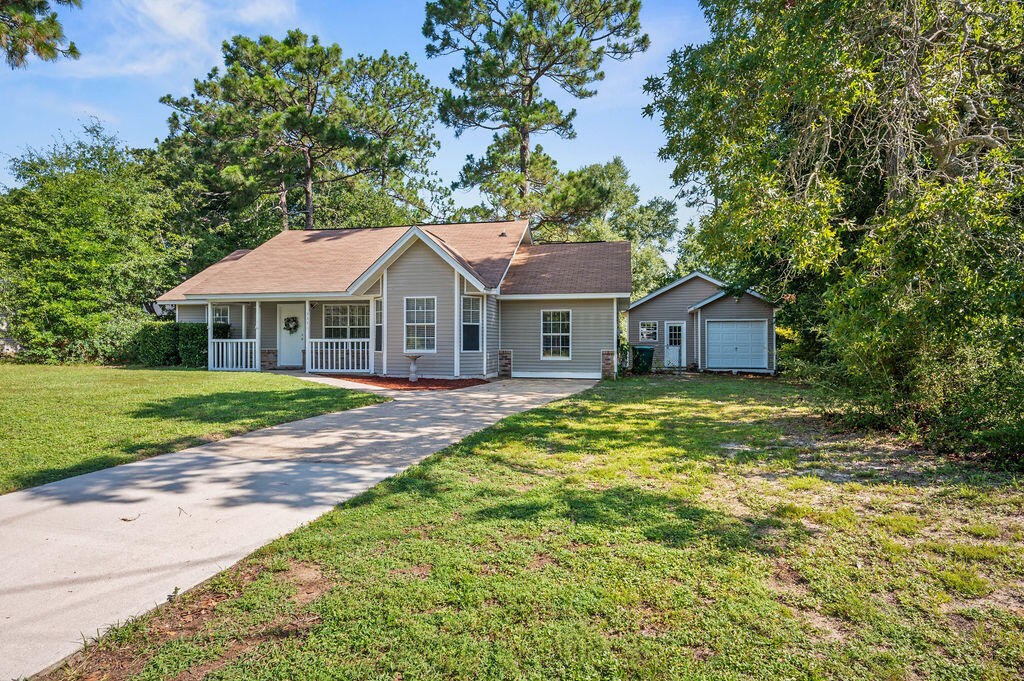 Welcome to this well-maintained 3-bedroom, 2-bathroom home situated on a spacious.35-acre lot in an established neighborhood SOUTH of I-10 with NO HOA and COUNTY TAXES. With two living areas, this home offers flexible living space & room to spread out. Interior features include wood and tile flooring, granite countertops in the kitchen, and stainless steel appliances. The large, private backyard is ideal for outdoor enjoyment, gardening, or entertaining, and includes a powered shed for added storage/workspace. A NEW ROOF and Home Warranty will be provided with an acceptable offer, providing peace of mind for the next owner. Additionally, an Assumable VA loan at a competitive 2.875% interest rate is available to qualified buyers with VA entitlement. Don't miss out of this opportunity!