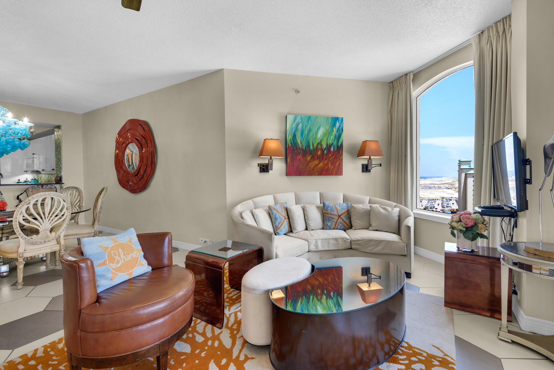This amazing 15th floor 2Br/2Ba with it's charming whimsical decor, makes this unit one of the most popular rentals on Navarre Beach. There is no comparison to the trend setting architecture, the spaciousness, the privacy, and the multiple exposures to the Gulf creating a life style like no other. This development is famous for its private entry ways, circular terraces overlooking the Gulf. Amenities include covered parking, Olympic size swimming pool, tennis courts, pickle ball, fitness room and social center with a full kitchen for parties and entertaining. This unit is being sold fully furnished.