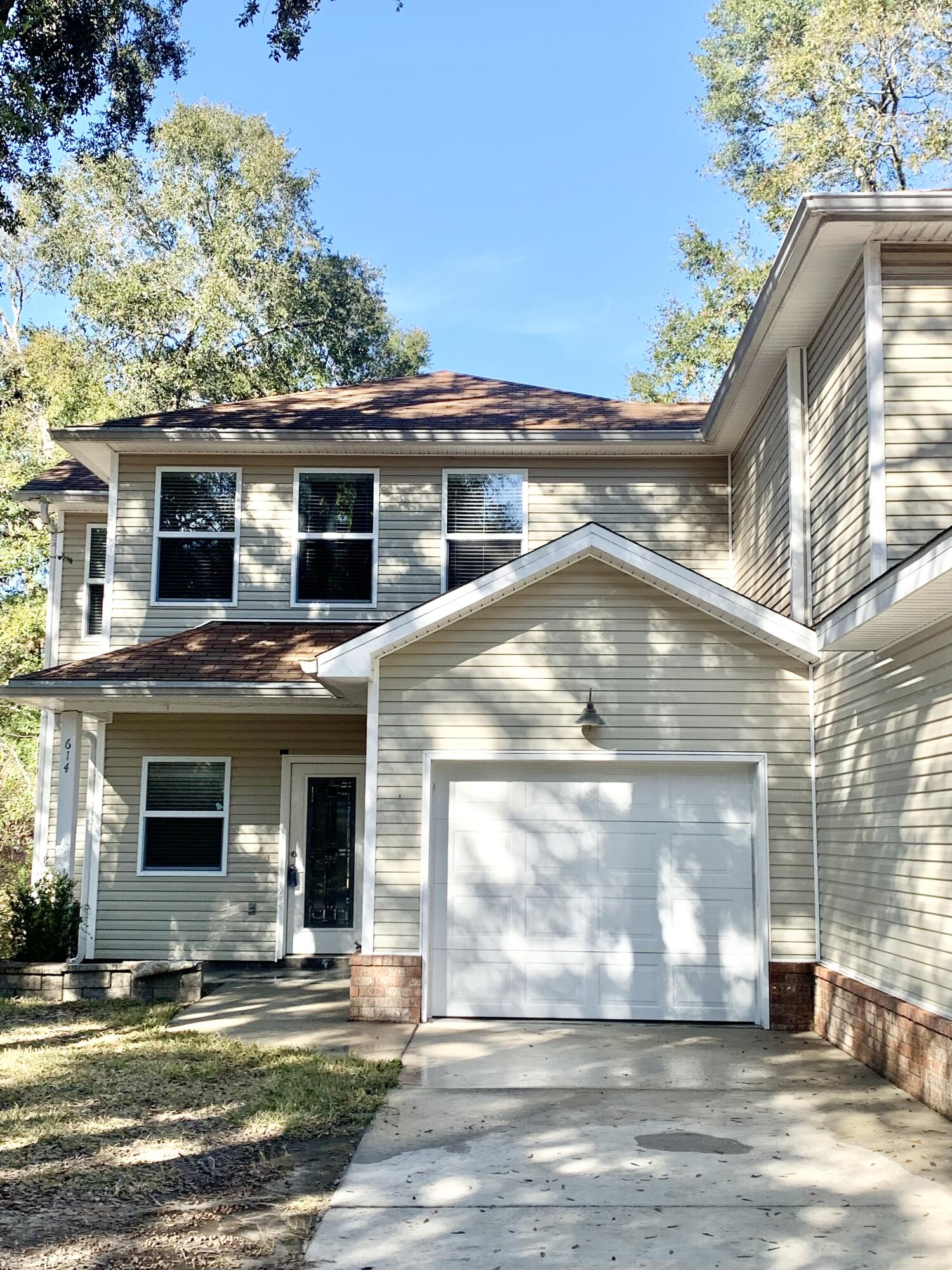 Sweet 3 bedroom, 2.5 bath town home in the heart of Niceville. Located by schools, Eglin, shopping and more. Master downstairs along with a large living room and lovely kitchen (new frig), laundry room and 1/2 bath. Two large bedrooms upstairs, plus a second full bath and LOTS of storage throughout. All bedrooms have nice sized, walk-in closets. The backyard has a new deck and new fence. One car garage. Tile in kitchen, living room and baths. Carpet in bedrooms.
