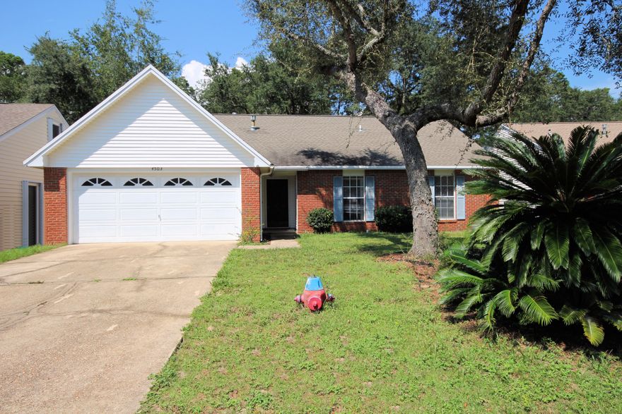 Very Spacious 4 bedroom home within Bluewater Bay! Home offers a first floor master along with 2 additional bedrooms. Cathedral Ceilings in Living Area, Fireplace, and new laminate flooring. Upstairs bedroom could be used as a bonus room/office. Large open kitchen with gas stove. Enjoy dinner on the enclosed patio. Walking distance to Bluewater Elementary! Within walking distance of shopping, banks, and restaurants.