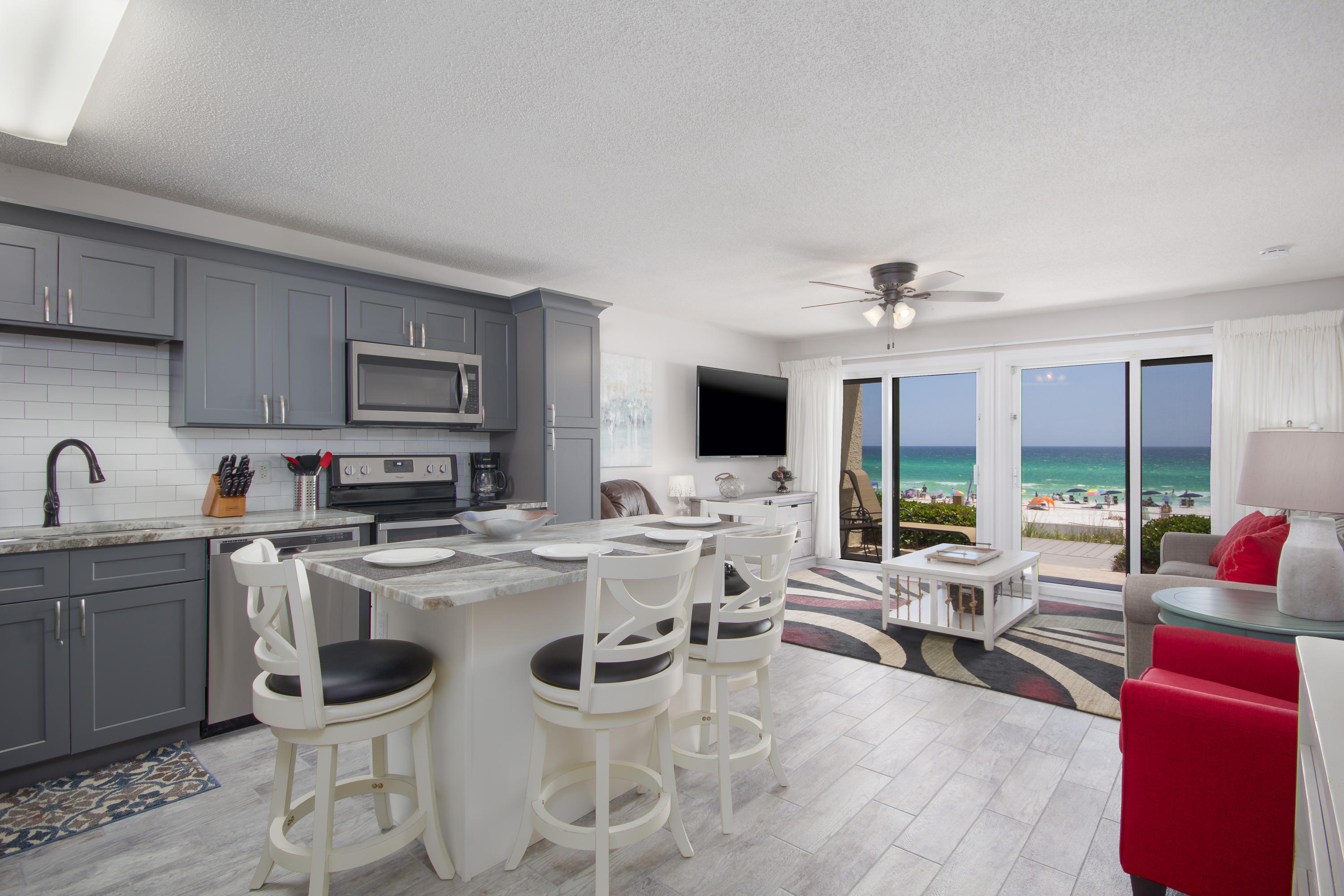 Don't miss out on this gorgeous unit with amazing Gulf views. This beautiful condo has an updated kitchen w/ island bar, new stone counter tops, new cabinets, and new appliances. You will also find new wood-look tile flooring, an updated bathroom w/ tiled shower, updated furniture/decor, and a walk-out balcony with great views and easy access to the Gulf. Call to schedule a private showing today!