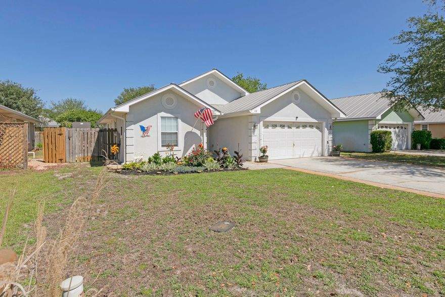 This incredible 4 Bedroom, 2 Bath single story home offers plenty of living space with an open floor plan, large breakfast bar, high ceilings, screened-in back porch, a perfect size yard for kids and pets and a 2 car garage.Complete renovations and makeover with new appliances, LVP flooring, granite countertops and water-filtration system all within the past 5 years.  (See appliance page)Driftwood Estates is a