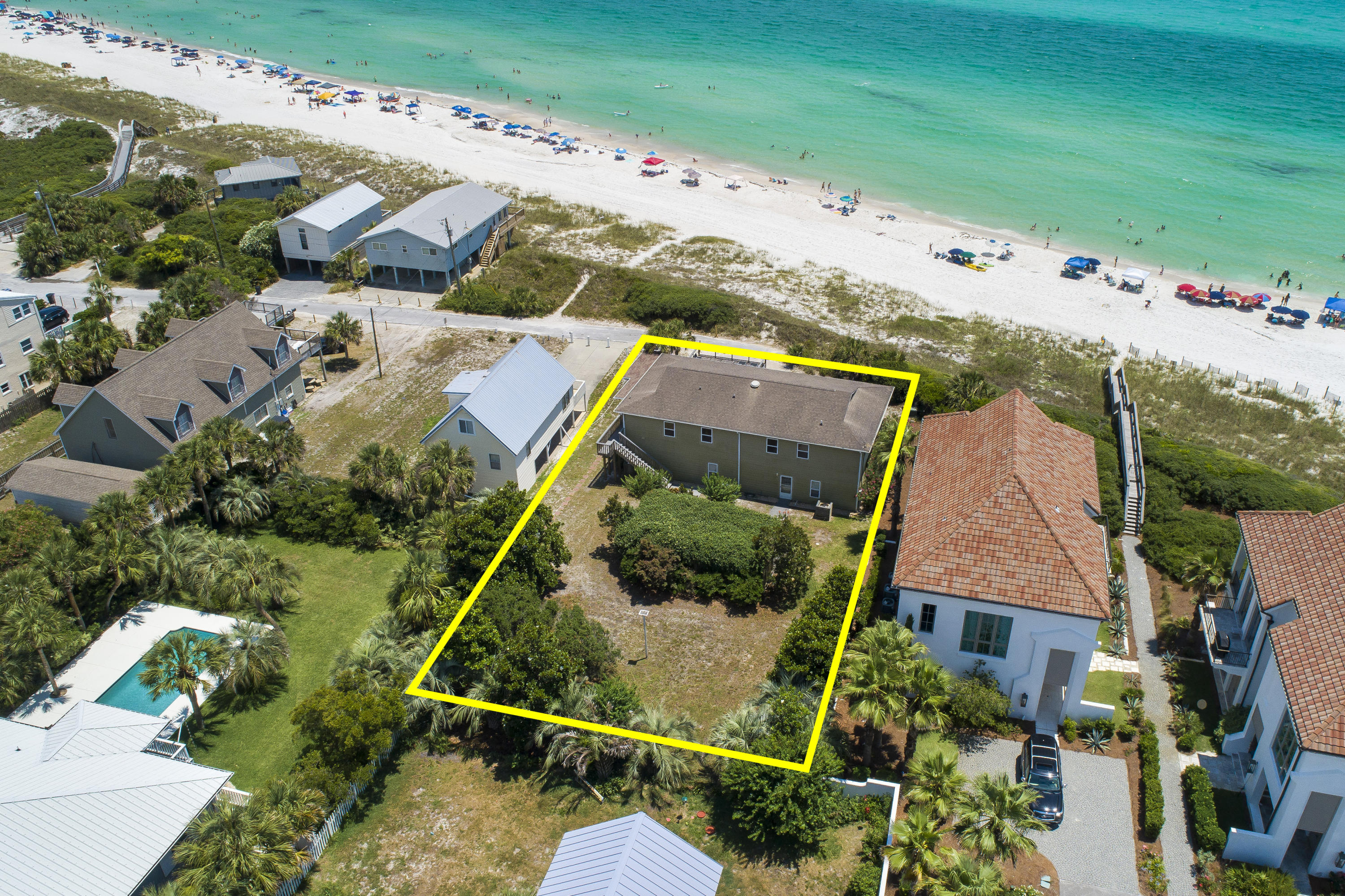 Enjoy 78 feet of UNOBSTRUCTED GULF VIEWS throughout the home and from the private deck. Large lot .23 acres with plenty of room for expansion and addition of pool and/or carriage house. The home features double living space with kitchens and bedrooms on both floors to accommodate family and guests. Owned by same family for 30+ years and never rented. Beach access walkover 50 feet from driveway. This home offers the ultimate privacy as it is prominently located at the end W Park Place Avenue.