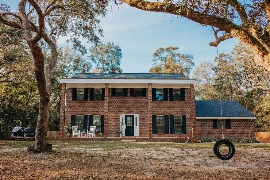 RARE OPPORTUNITY! Check this one out:  Beautiful and stately 2 story brick colonial sitting on over half an acre in central Niceville, with an amazing water view...Includes a new roof (Feb '21), new hot water heater (Feb '21) 2 renovated bathrooms, updated electrical panel, NO POPCORN ceilings, Freshly painted from top to bottom (Feb '21), all new fixtures (NO FLOURESCENT LIGHTS), and a fenced back yard. This house is move-in ready, or you could add an addition/pool and live it or flip it (comps in this neighborhood are OFF-THE-CHARTS!) Go ahead and keep looking if you must, but none will beat the value of this house! No private showings before the open house on Sunday, 14 March - but drive by viewings are encouraged! Photos on Friday, 12 March.