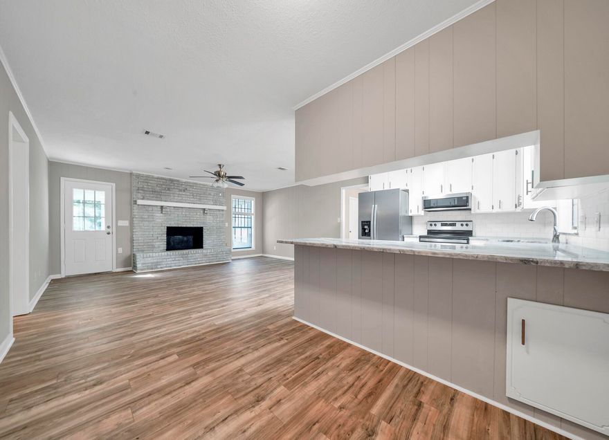 Incerdible deal on this completed updated home on .85 of a acre! 2024 Roof 2024 Ac 2024 Hot Water Heater-3BD 2 BA 1566 SF - Updated with New Paint Inside & Out. New Laminate Flooring throughout home with Carpet in bedrooms and Luxury Vinyl in baths. New fans/lights, Updated Kitchen with New Stainless Steel Appliance package, New Granite counter-tops and subway tile backsplash. Large Yard with .85 Acres total. Come and see this spacious property and start planning your move!