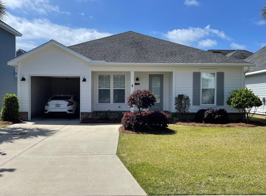 Gorgeous ''Ashely Design'' Florida Cottage in Phase III of Church Street Village, built by Huff Homes. This single-story design features 2br, 2bth w/office & 1 car garage, perfect for anyone downsizing or a coastal 2nd home. The cushy office is a plus (large enough for a day bed) and the spacious kitchen adorns granite counter tops, wood cabinetry & stainless-steel appliances. Wood flooring throughout kitchen, dining & living areas. Porcelain tile in bathrooms with plush carpeting laid in bedrooms. 9'ft ceilings, 8'ft doors & recess lighting throughout. Spacious Master suite has a walk-in closet, dual vanity & beautiful, tiled master shower. The current owner has lightly used the house and recently had it pressure washed and new trim paint. Shows like new! All measurements are estimates.