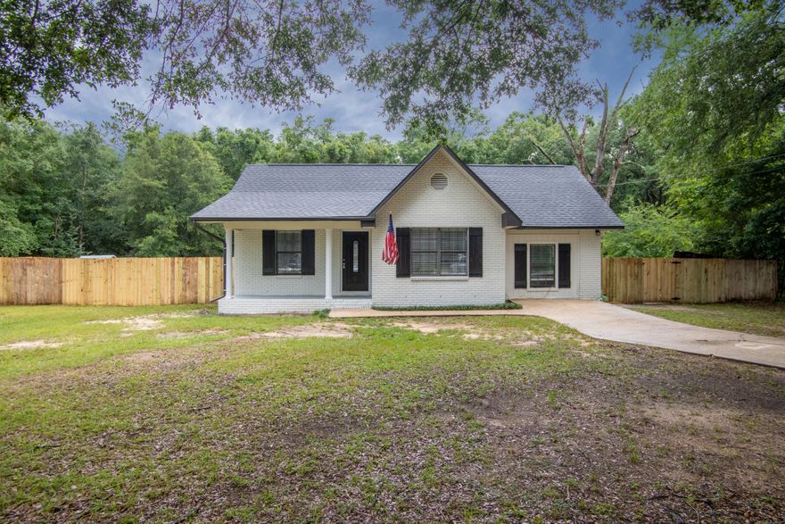 This sweet home has been updated and is ready for new owners.  New roof, New HVAC, New HWH 2022.   All new flooring (laminate wood   in living areas and carpeting in bedrooms) All new lighting, interior paint,, new kitchen with granite counter tops and stainless steel appliances  Ceramic Cooktop Stove with self cleaning oven,  a ice-maker refrigerator.  Both bathrooms have new counter tops, lighting, mirrors etc.  Special feature is extra room just off the kitchen that can be used for whatever you need  (computer, sewing, crafts, playroom etc).  Home also has a extra room for computer, crafts, Fully fenced on 1/2 acre lot..