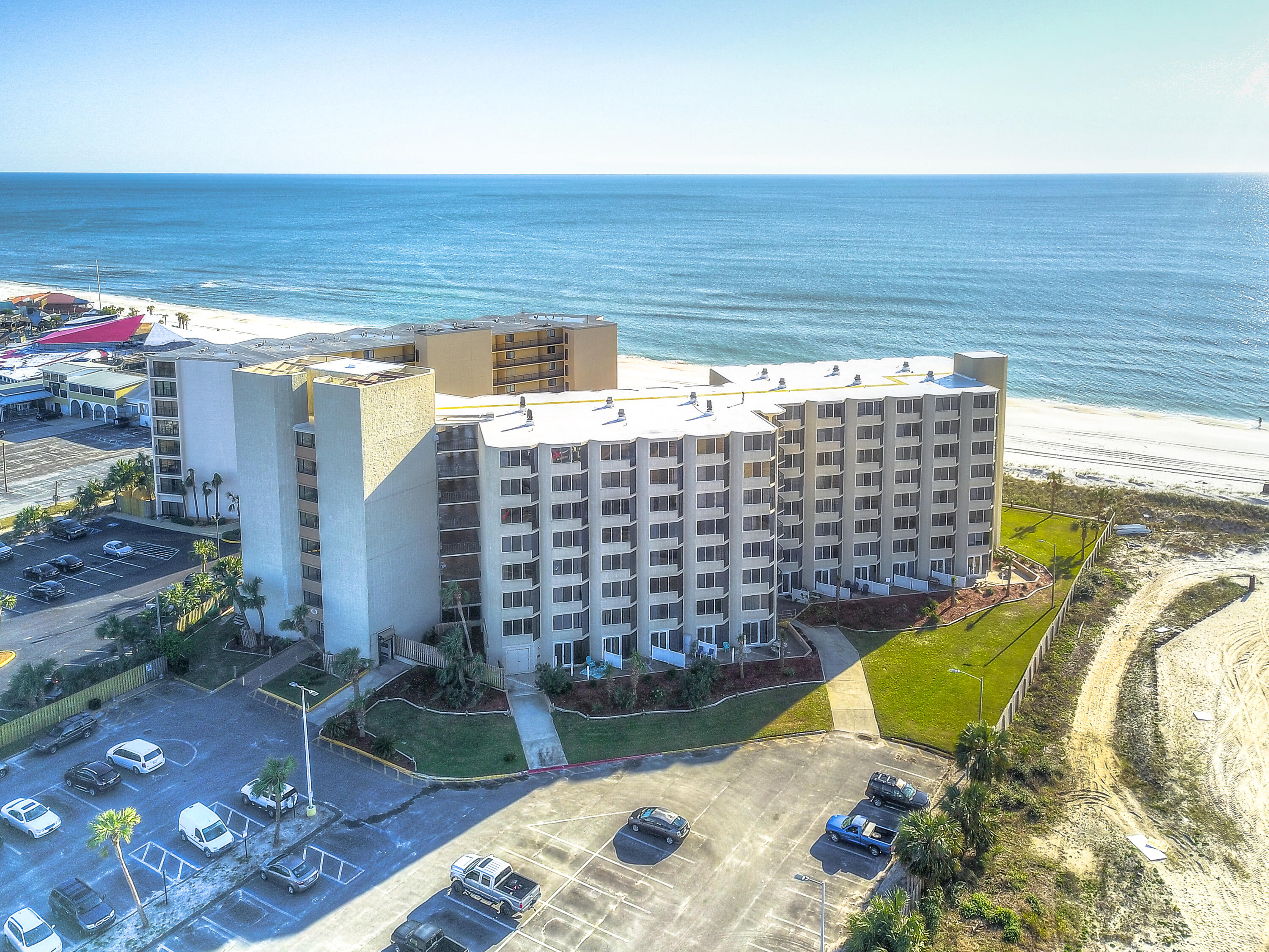 Gulf Front, Immaculate Studio condo in Top of The Gulf. This unit is on the prime floor for rentals, overlooking the pool and great views of the gulf. Unit faces the gulf not the parking lot. Newer refrigerator & microwave. All tiled flooring. Very clean and well taken care of. Top of The Gulf Condominium has had several upgrades in the past few years to include NEW exterior doors and windows in all units, complex-wide wi-fi, gulf side, oversized pool & kiddie pool resurfaced in Nov/2017 with nighttime lights, revamped poolside snack bar., a canopied sitting area close to the beach, sundeck updated, two observation decks facing the Gulf, picnic area with community grills. Don't miss out on this affordable gulf front condo close to shopping, restaurants and entertainment.