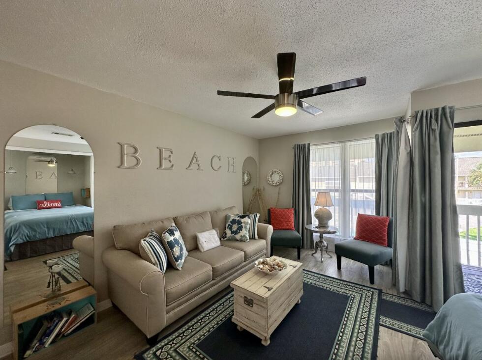 Welcome to Studio #8214! The perfect beach getaway w/ plenty of coastal charm and a peek of the Gulf from your balcony. This delightful second-story condo features updated stainless steel appliances & offers a cozy yet stylish retreat.While compact, this fully furnished studio boasts a full-size kitchen with modern appliances, a breakfast bar, & an open floor plan. It includes a queen bed & a sleeper sofa, ensuring comfort & flexibility for your stay. Step out onto the balcony & enjoy a peek of a beach views & soak in the coastal atmosphere. Access available to incredible on-site amenities. Deeded gulf front access, 5 pools, hot tubs, 9-hole par 3 golf course. Be Test your skills on the pickleball & tennis courts. Or simply relax & unwind in the serene environment.New Photos to Come.