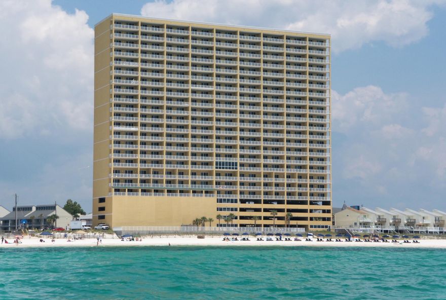 Fully furnished 3bd, 3 ba gulf front condo located on west end of Panama City Beach! This 5th floor keyless entry unit has one of the largest balconies in the complex(over 400 sqft). The 2 king master bedrooms each have their own en suite bathrooms. One master bedroom and living room both face the gulf. The 3rd bedroom has 2 double beds with full guest bathroom off hallway. All bedrooms and living room have flat screen TV's. Condo can sleep up to 10 people comfortably. Granite kitchen countertops and brand new SS French door fridge. Separate laundry room with full size washer/dryer. New upgrades include 18'' porcelain tile flooring in all common areas, newly tiled kitchen backsplash and bar. Deeded and covered parking space come with unit. $51,000+ gross income in 2014. Won't last long!