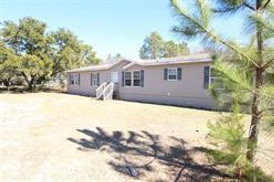 Yard in need of TLC but the inside is BEAUTIFUL. Home has been cleaned, painted, new carpet, etc. Air unit will be re-installed at closing. Has a 2 car Garage (needs work) Close to Eglin Air Force and Hurlburt Field and the beaches.