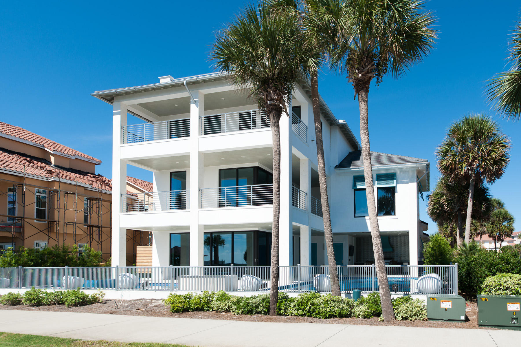 REDUCED $650K from list price! 4662 Destiny Way defines a sleek coastal modern design & was designed with precise attention to detail & selections to deliver an exceptional luxury beach house tailored for entertaining. Custom built, the all-concrete residence is just over 5,800 conditioned sq ft & five full bedrooms, with over 8,800 sq ft under roof. Steps to the beach capturing expansive gulf views, the residence boasts a most impressive pool deck with outdoor living & summer kitchen. Glass doors on the first level surround the entire south of the residence & open to the pool deck from the lower level living & game room area. The staircase is a focal point, imported from Italy. A open floor plan with special attention to window design, to capture views. See attached rental pro forma $243