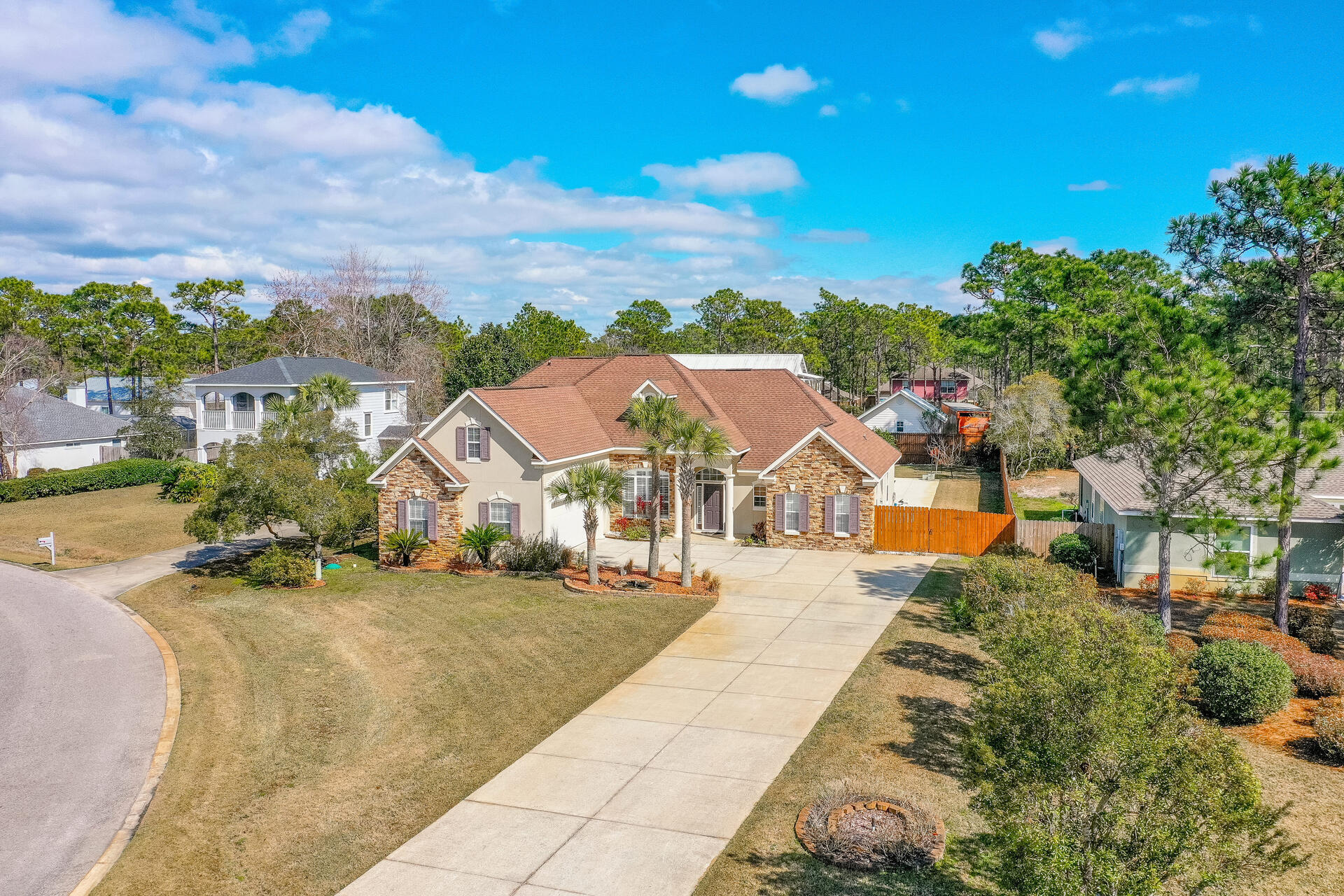 Welcome to 108 Pelican Bay Drive.  This home checks all of the boxes!  BRAND NEW ROOF (coming March 2022).  The home is situated on a large lot which is nearly 1/2 acre in size.  The spacious fenced back yard includes a private pool and covered patio.  The driveway and two car garage provides an abundance of room for parking and storage.Inside the home you will appreciate a kitchen that is a chef's dream.  There is a gas range, double oven, oversized refrigerator/freezer, and ample cabinet and countertop space.  The master bedroom is on the first floor along with two more bedrooms and two more bathrooms.  There's also a bonus room which would make for a great office, den, or play area.  Upstairs you'll find a 4th bedroom, full bath, and a bonus/media room