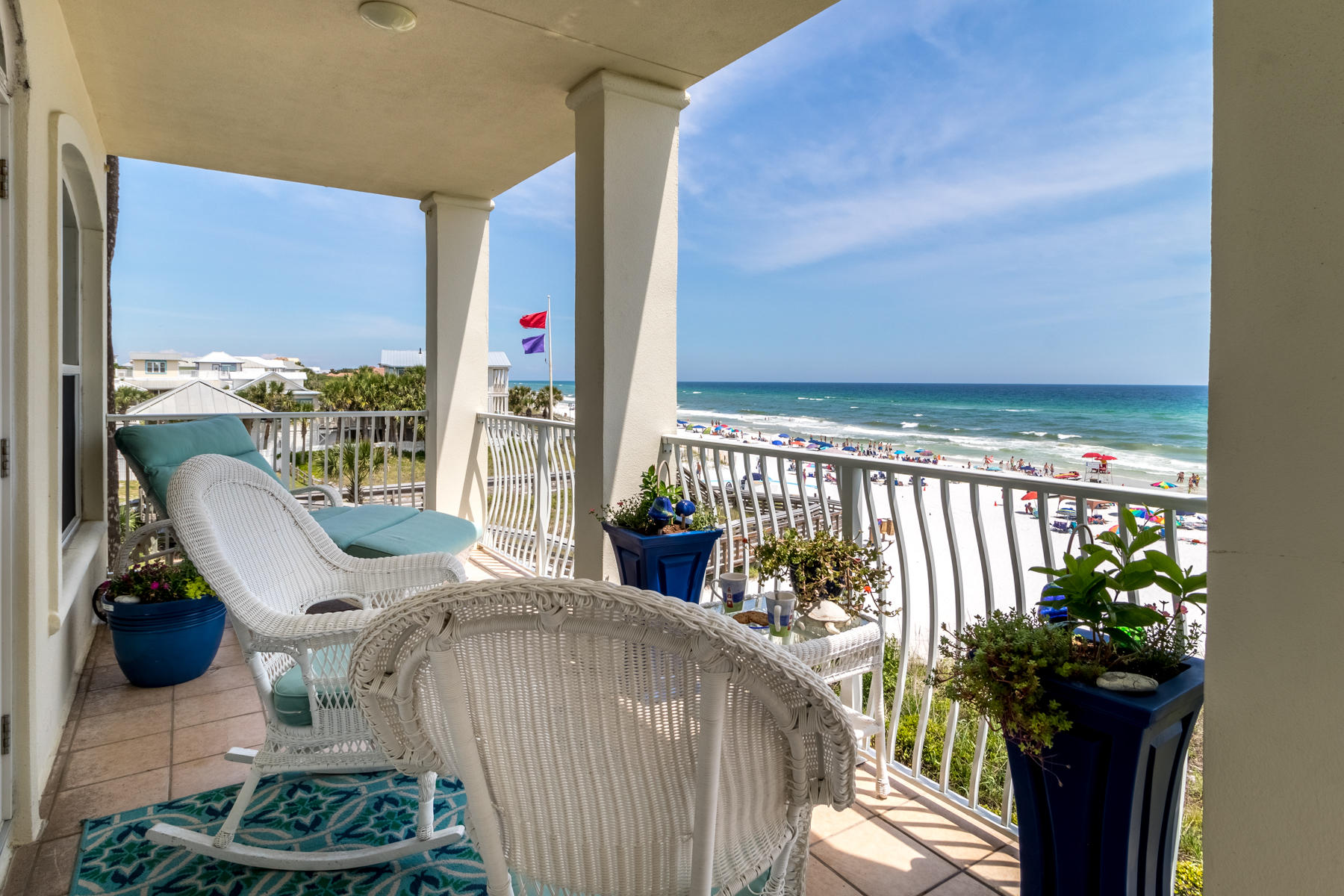 VILLA ST JACQUES....rare second floor unit at The Villas!  As you enter this gulf front condominium, you realize that you have arrived at a special place.  The custom renovation and features set this home apart.  Attention to every detail is exhibited throughout the residence.  Originally designed as a full-time residence, the owner of this unit spared no expense in making this home a one-of-a-kind home on the beach.   Custom woodwork, custom cabinets, signature lighting, designer kitchen, and imported flooring are a few of the features of this home.  Hurricane rated windows were installed two years ago completing the renovation.  If you seek a permanent home at the beach, are looking for that second home for family getaways, or want an investment property, this home is for you!