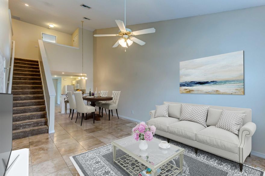 Welcome to Palmetto Trace, a family-friendly community in a fantastic location in Panama City Beach. Great large three bedroom town home features fresh coat of paint throughout, upgraded tile flooring for easy care in the living and dining area and also in master bedroom which is conveniently located on the ground floor. The kitchen features breakfast bar and includes all appliances. There are two bedrooms with a ''Jack-n-Jill'' bathroom on the second level as well as a loft area perfect for home office, children's play area, or a small home theater. You'll enjoy the views of the conservation area from the screen enclosed rear patio. That means no homes directly behind you! Exterior features attached garage and extra long driveway.