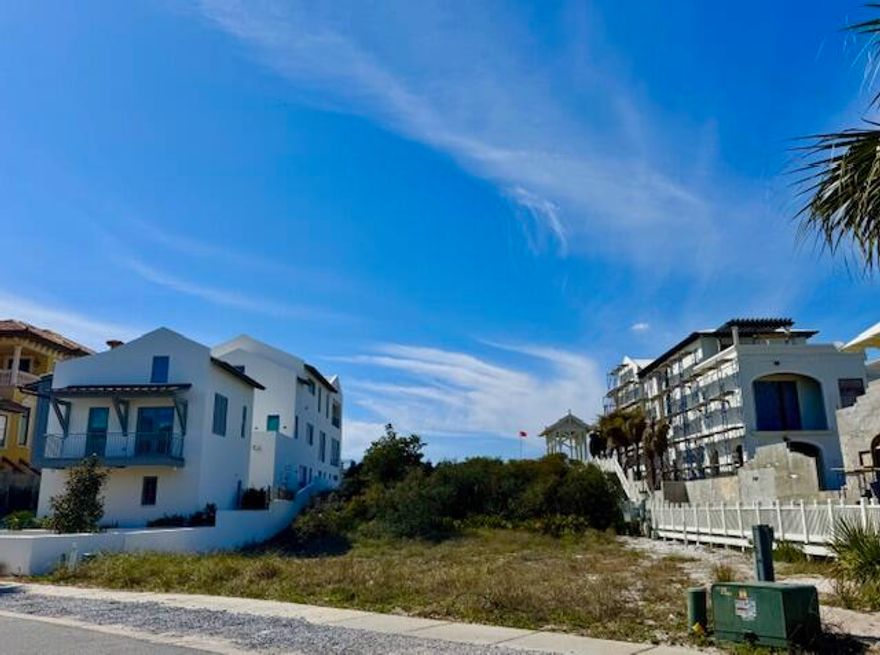 Last spectacular 60' gulf front lot with its own private beach walkover and across the street from Lake Carillon.  The exceptional depth of this lot allows for a large house, a pool, and an oversized guest house.  Previously approved plans for a magnificent house and guest house are available.  Do not miss out on the last 60' gulf front lot available in Carillon Beach.