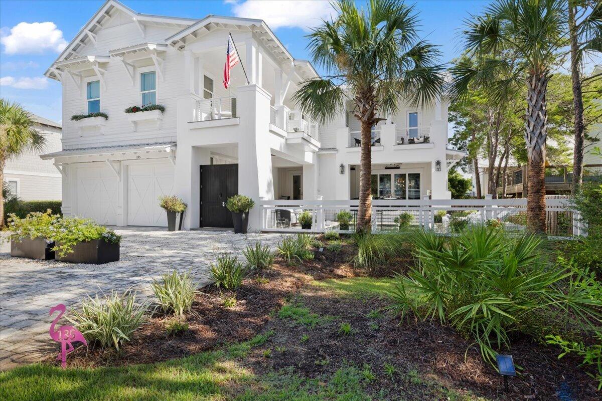 This beautifully appointed home, south of 30A, features distinctive architecture and is surrounded by large decks and patios. This custom home has easy beach access and is within walking distance to many restaurants and local shops in the area. The towering vestibule provides entry to the courtyard swimming oasis, outdoor kitchen and living areas. Inside you will find a vast open floor plan with a chef's style kitchen adorned with quartz countertops, 42 inch gas range, wine cooler, ice maker, and more. There is a downstairs master and extra bedroom on the main level. The extra bedroom is currently being used as a fitness room but can be changed back if desired. The upstairs features another master and 3 additional suites. Changes have been made to 2 of the 4 upstairs suites but can be reversed back to bedrooms if needed. One is a cozy theatre room and the other is a large custom walk in closet. The owners has spared no expense with the many upgrades of this home including custom light fixtures, drapes and an inviting outdoor kitchen area. You have to see this home in person to appreciate the attention to detail.