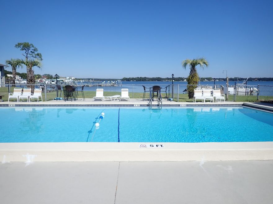 WATERFRONT! Complex includes not only the most incredible views of the Bayou, includes pool, boat slips, BBQ areas along with great neighbors. Condo is 3/1 all tile and newly painted and has its own washer and dryer hookups. Complex also has its own laundry room.