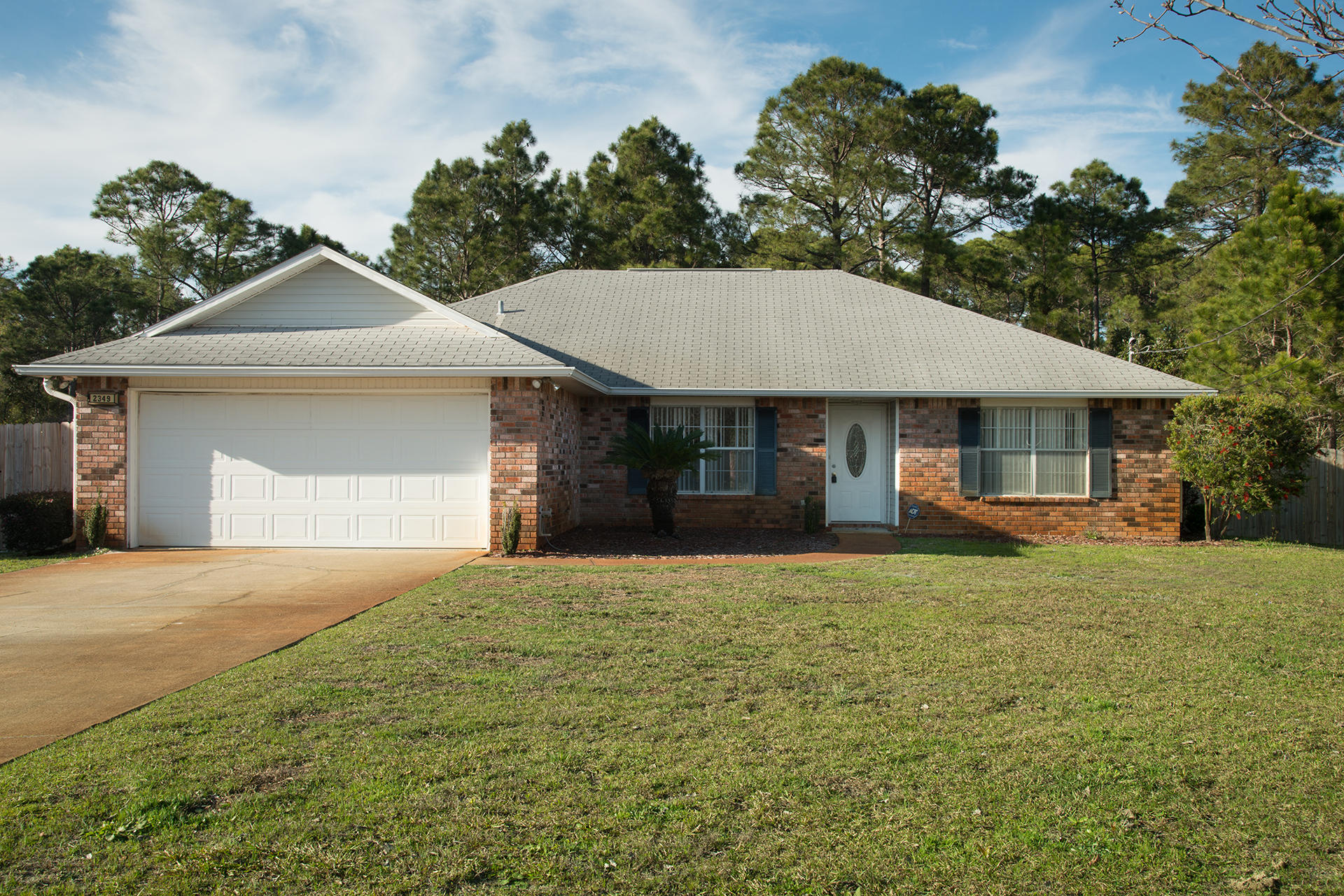 Located 7.5 miles from Hurlburt Field AF Base and minutes away from beaches, shopping, eateries and schools. Features include a spacious great room with wood fireplace and high plant ledges, formal dinign room, gourmet kitchen with stainless steel appliances, island, tile flooring, split floor plan, master bath with double sinks and garden tub and a large, fenced back yard.Sorry, no Smoking in home or garage. Small pet may be considered.