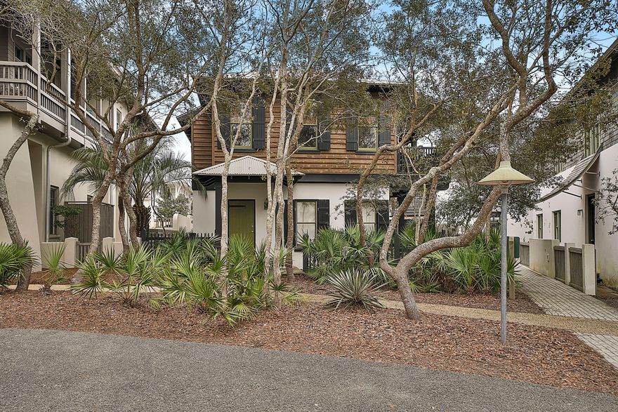 One of the first homes built in Rosemary Beach, 319 E. Water Street is all about location. Less than a minute walk to the Coquina Pool and about a minute and a half to the beach walkover leading to the stunning Gulf of Mexico. Dining and shopping are easy too as the Rosemary Beach Town Center is just a short walk away. Small in stature compared to the newer constructed homes, 319 E Water will leave you nostalgic for easy living and simpler times. Sited on a larger lot, there is also room for improvements should you so desire - a first floor addition perhaps or a garage/carriage house and still ample room for a lovely outdoor space. The star of the show is the large, open 2nd floor living, dining, kitchen area. Beams and an expansive metal ceiling give a tropical flair.