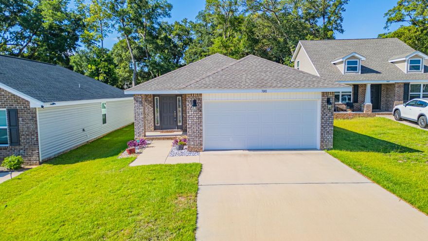 Location, Location, this home has an easy commute to the interstate, shopping, hospitals, restaurants and UWF.  This like new home has no carpet, LVP throughout the home.  Split floor plan, living with tray ceiling and ceiling fan.  Kitchen had plenty of cabinets, granite counter tops, breakfast bar, recessed lighting and stainless steel appliance.  The main bedroom suit is at the back of the home for privacy, large walk in closet, tray ceiling and ceiling fan.  The main bathroom has garden tub shower combo and double vanities.  The other two bedroom are up front with their own full bath along with the laundry room.  Exterior features, brick front with covered porch entry, low maintenance siding, open patio in back with a fully fenced in yard.