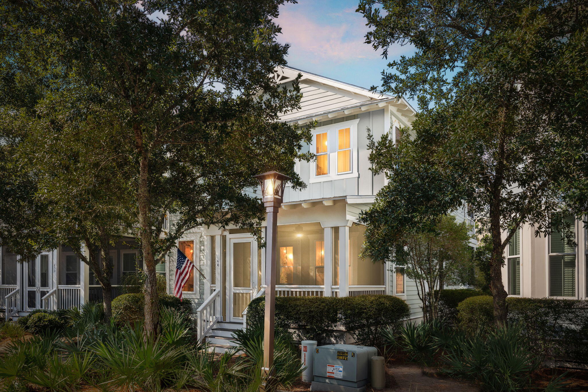 Introducing 844 Sandgrass Boulevard in NatureWalk at Seagrove - a truly rare opportunity! Homes in this prime location don't come available often, and this one is situated directly across from the community pool, playground, Lily Lane beach shortcut, and preserve boardwalk trails. Offering the ideal blend of convenience, charm, and tranquility, this home is an absolute must-see.Step inside and experience a well-maintained, never-rented property showcasing solid pine floors and high-end furnishings. The layout is both functional and stylish, with a first-floor primary suite and two additional en suite bedrooms upstairs. A loft, a bunk room, and a unique 4.5 bath configuration provide ample space for family and guests. The fenced courtyard is the perfect spot for grilling, relaxing, or letting your pets enjoy the outdoors in a private, serene space. With front and back entry access, guests and family can come and go with ease. Rarely seen in NatureWalk, this home offers generous parking for up to three cars and a golf cart, all without sacrificing curb appeal. The property also includes a Gem cart with a winter kit and heater for year-round use, as well as a Generac generator for peace of mind. Mature landscaping surrounds the home, and the front porch invites you to unwind while enjoying evening cocktails under the charming street lamps and stunning sunset views. Additionally, three screened porches with ceiling fans offer privacy and relaxing vistas.
NatureWalk at Seagrove offers an unparalleled lifestyle, with exceptional amenities designed for outdoor enthusiasts. Miles of scenic walking and biking trails, including the Lily Lane beach shortcut, lead directly to the pristine, sugar-white sands of 30A. The community features a fitness circuit, sports courts, and a Gathering Place pavilion with a gas grilling area and a cozy fire pit, perfect for socializing. Enjoy the resort-style pool, heated lap pool, shaded children's pool, hot tub, hammocks, and playgrounds - ensuring there's something for everyone.
This meticulously cared-for home is ready for its next chapter. Don't miss your chance to own a piece of one of NatureWalk's most coveted locations, where luxury and nature effortlessly combine.