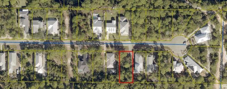 Have you dreamed of designing and building a home that can be enjoyed for years to come? This generous lot, located on the west end of County Highway 30a offers a multitude of options for your dream home. Spotted Dolphin is a quiet residential street with proximity to several  beach access points, Butler Elementary, as well as dining and retail options. With approximately 0.19 acre, this lot is near the end of the cul-de-sac, and offers to the prospective buyer a wooded, quiet setting for the culmination of a dream residence for either full-time living, second home, or a vacation home.