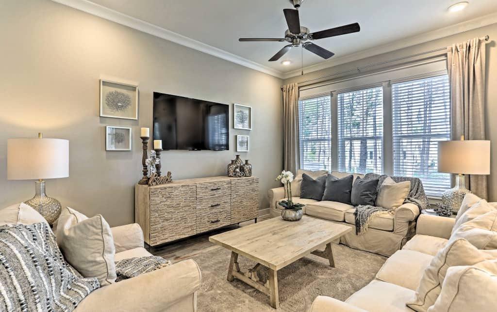 The ''Cozumel'' Triplex Townhome floor plan is uniquely designed and comes fully furnished, rental ready, and includes a 2018 EEVM 6 seat LSV (golf cart). This beautifully appointed unit has 3 bedrooms and 2.5 bathrooms with a 2 car garage. Home features include 10ft Ceilings, hardwood floors, quartz countertops, stainless steel appliances, upgraded lift master garage opener, control 4 system for remote A/C and door lock operation, Apple TV, 4K TV, and Williams Sonoma cookware plus much more! Prime Location with green space in back and is just a short stroll to the community pool. Owners and guests will enjoy the close proximity to the eateries, shops, and entertainment of The HUB, which is just across 30A. Live the beach life!!!
