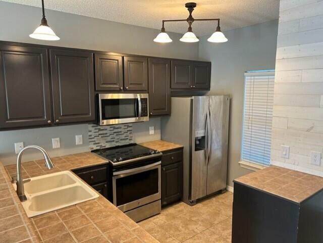 3 bed/ 2 and a half bath home in a quiet neighborhood only minutes from Navarre Beach, Gulf Breeze or Mary Esther. It is currently occupied until the end of July, but will be available to view and move in on August 1st. Our office is located in the Winn Dixie shopping center at 8666 Navarre Parkway. Office hours are Monday - Friday 9am-5pm. Keys can be checked out for a viewing. Keys must be returned by 5pm and cannot be kept out overnight. No weekend showings. For more information, call Navarre Beach Realty Property Management at 850-936-0700.