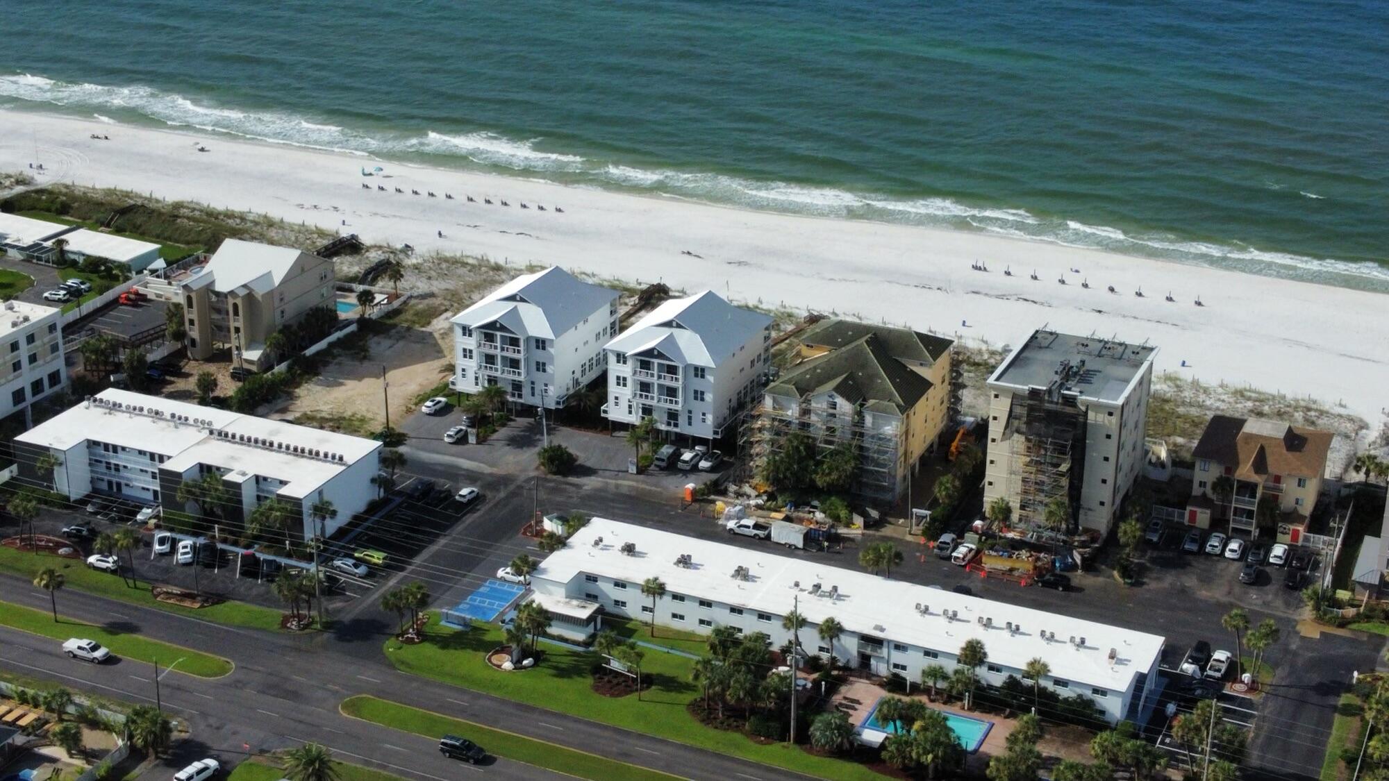 Welcome to Mar-a-Sol, an exquisite waterfront residence on Okaloosa Island. This distinguished property boasts 69 meticulously updated units, comprising one- and two-bedroom configurations, each adorned with modern and stylish finishes. The East building offers unparalleled full Gulf front views, while the West building provides partial vistas, with every unit being a mere 10 feet from beach access and just 100 feet from the pristine waters.  Each unit features gourmet kitchens equipped with stainless steel appliances, luxurious granite countertops, and tasteful backsplashes. Elegant LPV hardwood flooring graces the living spaces, and the master suites offer spacious ensuites with ample room for nightstands and a desk. With an impressive 97% occupancy rate, Mar-a-Sol accommodates both long-term and short-term tenants. The owners have meticulously updated the exterior with sophisticated white and black paint, complemented by modernized landscaping and stylish pool furniture, creating a chic and inviting ambiance. 

This property presents an array of opportunities. You can seamlessly continue the current thriving business or redevelop the buildings into new condominium units or beach homes. The location, combined with stunning Gulf views and immediate beach access, ensures endless possibilities for this highly coveted property. 

Okaloosa Island is a gem on Florida's Emerald Coast, nestled between the Gulf of Mexico and Choctawhatchee Bay, and known for its pristine white-sand beaches and crystal-clear waters. This idyllic barrier island offers a plethora of activities, including swimming, sunbathing, and a variety of watersports like jet skiing, paddle boarding, and snorkeling. Visitors can enjoy fishing on the Okaloosa Island Pier, embark on dolphin cruises, and explore scenic nature trails. The island boasts a vibrant dining scene with beachfront eateries and fine dining options, as well as lively nightlife. Family-friendly attractions like the Gulfarium Marine Adventure Park and local shopping add to the island's charm, making it a perfect destination for relaxation and adventure. 

Fort Walton Beach is undergoing a remarkable revitalization of its downtown area, and the replacement of Brook's Bridge is currently underway. Additionally, Okaloosa Island has plans for a 4.3-mile multi-use pathway, providing a safe and scenic route for bicyclists and pedestrians. These exciting developments position Mar-a-Sol in a prime location to benefit from the growth and transformation of this vibrant, up-and-coming community. Do not miss out on this rare opportunity with a special location!  