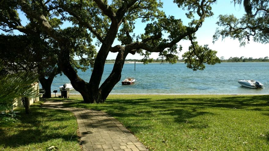 Beautiful view to the courtyard. Complex has a nice pool overlooking the Sound. Community room and laundry facility on first floor, Elevators at each end of the building for your convenience.. Kayaks and canoe can be stored. Fish off the dock but not boat slips. Seller is offering ''as is'' however Everything is in working order. Estimates are coming in for painting and complete renovation and price with go up with reno. This gives you the opportunity to renovate as you wish. Cedars complex offers ample parking and is near Hurlburt and Target and Restaurants and the mall.