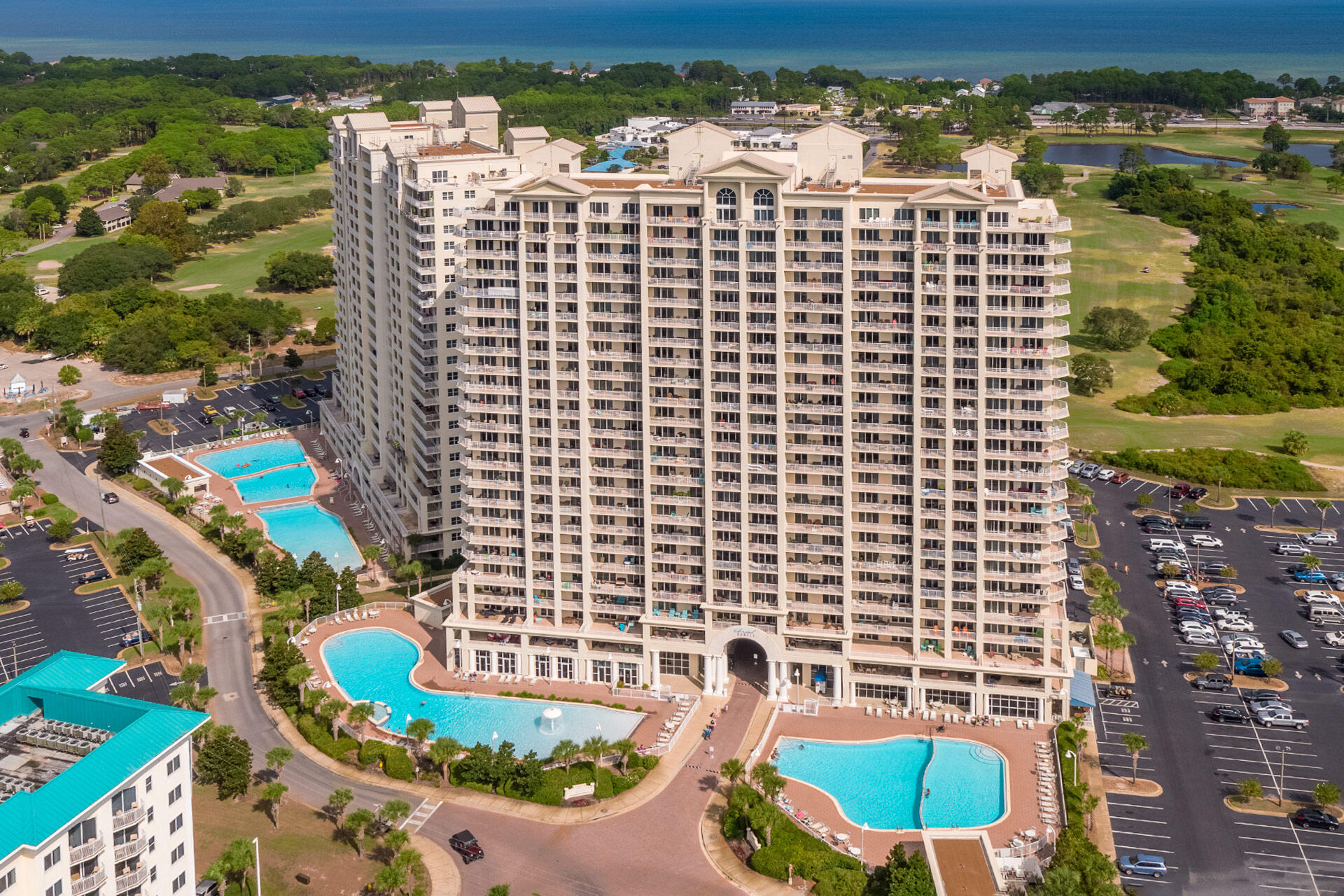 One of the nicest three bedroom condo in Ariel Dunes and on the Emerald Coast for the price. Completely redone ( Builders Own Unit and non rental at the time ) in 2007(when new)with high end finishes including crown molding throughout - completely repainted with oil based enamel on trim and doors - eggshell walls - beige travertine floors with mocha tumbled marble diamonds - slab travertine in master bath - granite tops in other two baths - all upgraded plumbing fixtures and light fixtures - $50/yd carpeting in bedrooms - framed mirrors - thick plate enclosure in hall bath with travertine walls - SOLD FULLY FURNISHED - (premium furnishings - not condo package)- Built in 2006, Ariel Dunes is one of the nicest developments along the Emerald Coast.