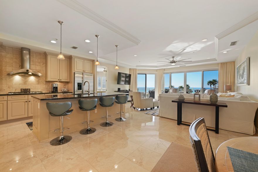 This beautiful Villa in Grand Dunes II is the most popular 4BR floorplan in all of Grand Dunes ( the ''50'' stack ) which is a west-end unit. It is a first floor Villa, but offers a 3rd floor elevation, so the views are gorgeous! It boast 2,844 sq.ft of living space and is being offered fully furnished!Features of this unit include: Honed, sealed and polished travertine in the foyer, living area, kitchen, hallways and baths, carpet in the bedrooms, granite countertops and vanities, soft-close drawers & cabinets throughout, flush mount LED can lighting, upgraded light fixtures, wall mount HD TV's in living area & all bedrooms, seamless glass in showers, built-in office in hallway, built-out laundry room w/ custom cabinets, granite tops and basin sink,