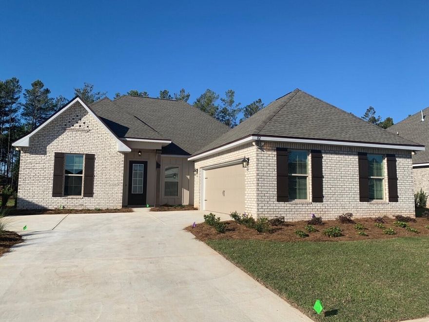 The HARMAND III G in The Trails at Hammock Bay community offers a 4 bedroom, 3 full bathroom, open and split design with a formal dining room and a flex space. Upgrades added (list attached).Special Features: separate vanities, garden tub, separate custom tiled shower, and walk-in closet in master bath, tray ceiling in master, double vanity in 2nd bath, kitchen island, walk-in pantry, boot bench and drop zone in mud room, covered patio, side-entry garage, recessed lights, custom kitchen backsplash, undermount sinks, bronze plumbing fixtures, framed mirrors, landscaping, architectural 30-year shingles, flood lights, and more!Energy Efficient Features: tankless gas water heater, kitchen appliance package with a gas range, low E MI windows, and more!