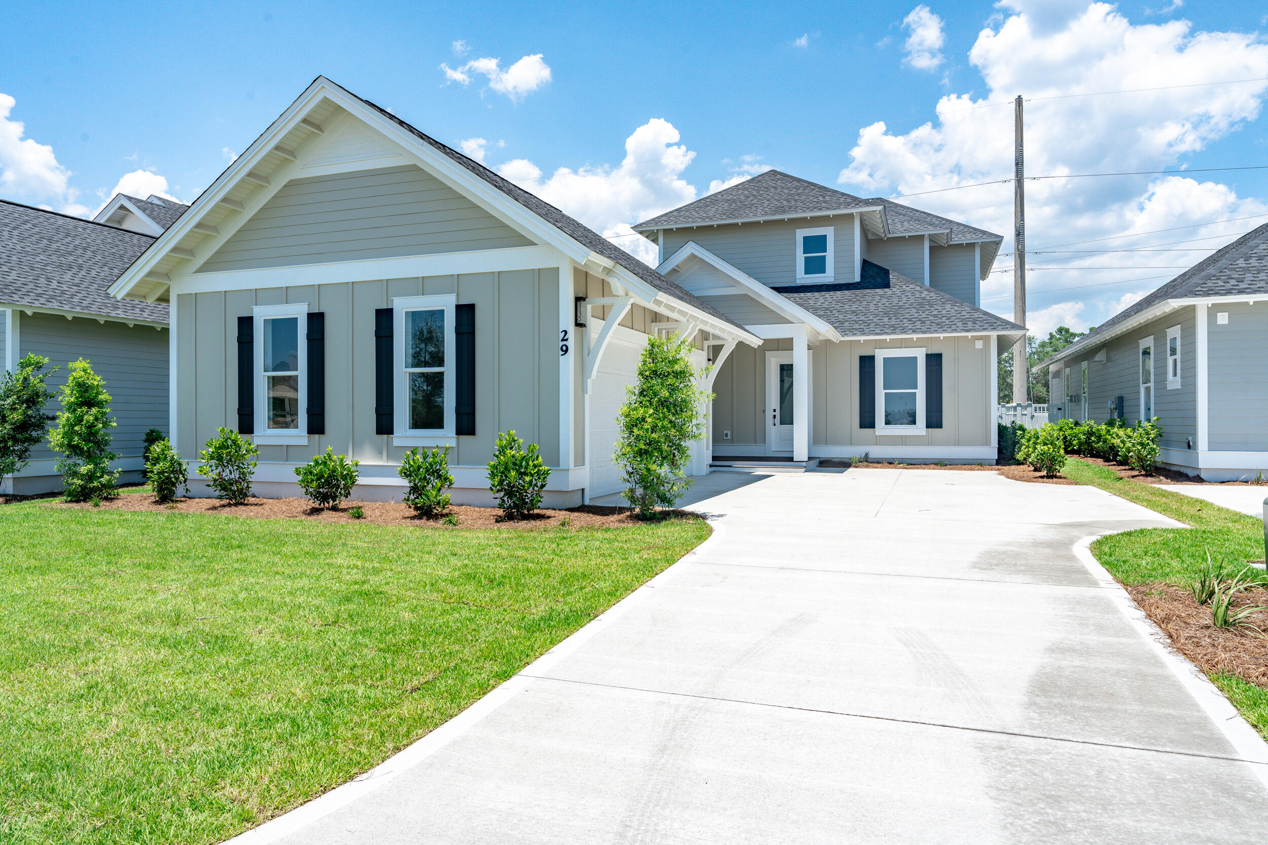 MOVE-IN READY!! Welcome to the brand new Royal Fern plan from Boswell Builders, nestled in the coveted Watersound Origins neighborhood, Powell Landing East. **Seller offering $5,000 closing cost credit - ask WSO community sales specialist for details. This new 2-story home design features 4 bedrooms, 4.5 bathrooms, and a fully equipped outdoor living space with a private pool + spa and outdoor kitchen. The main living space features a grand, open-concept great room with a living room fireplace and a stunning kitchen featuring wood cabinetry, quartz countertops, and stainless steel appliances (36'' gas range, vent hood, microwave drawer + more). This home also features 10' ceilings throughout, luxury vinyl plank floors + tile in bathrooms, wood closet shelving, crown molding in main living areas and primary bed + bath, and 8' interior doors.
The spacious primary suite is on the first floor, featuring a massive walk-in closet, double vanity, tiled walk-in shower, and freestanding bathtub. The second bedroom is also located on the first floor, with bedrooms 3 and 4 on the second floor, along with 2 full bathrooms, and multi-purpose loft space that could be a media room. Step outside onto the screened porch where you'll find a luxurious summer kitchen with weatherproof nature cast resin cabinets, quartz countertop, and 34" Coyote gas grill with vent hood. This home also includes a pool + spa package for maximizing your outdoor Watersound Origins lifestyle.
The Watersound Origins community is one of South Walton's most coveted neighborhoods for its exceptional amenities, beautiful new homes, and prime location. Amenities include the Village Commons pool & fitness center, sports courts including tennis and pickle ball, miles of nature trails, dock access to Lake Powell, unlimited golf, and lots of green space for outdoor play. The all new Watersound Town Center brings a new level of excitement and convenience to the community with a Publix Super Market, delicious restaurants, healthcare facilities, and more right at the entrance to the neighborhood! *Pricing for inventory homes include lot premiums and may include optional upgrades. Added options/upgrades and pricing are subject to change.