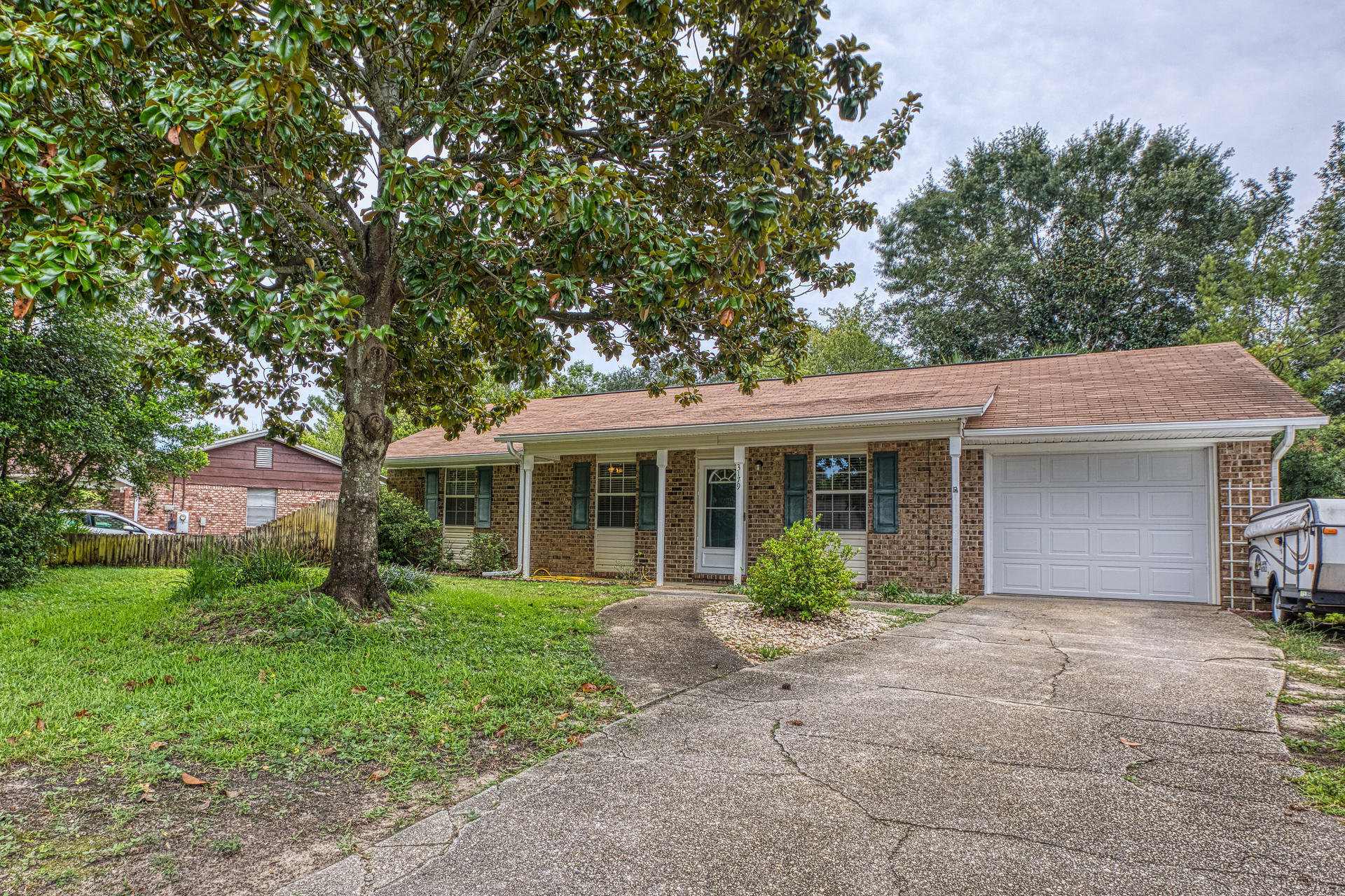 This home is a must see !!!! Fantastic location in Gulf Breeze with stop light at subdivision entrance. 3 bedrooms 2 bath. Close to everything. Large lot with new back deck. Features 42'' upper cabinets and granite counter tops in beautiful large kitchen, with pantry. Inside laundry room. Everything you need to make this home your own.
