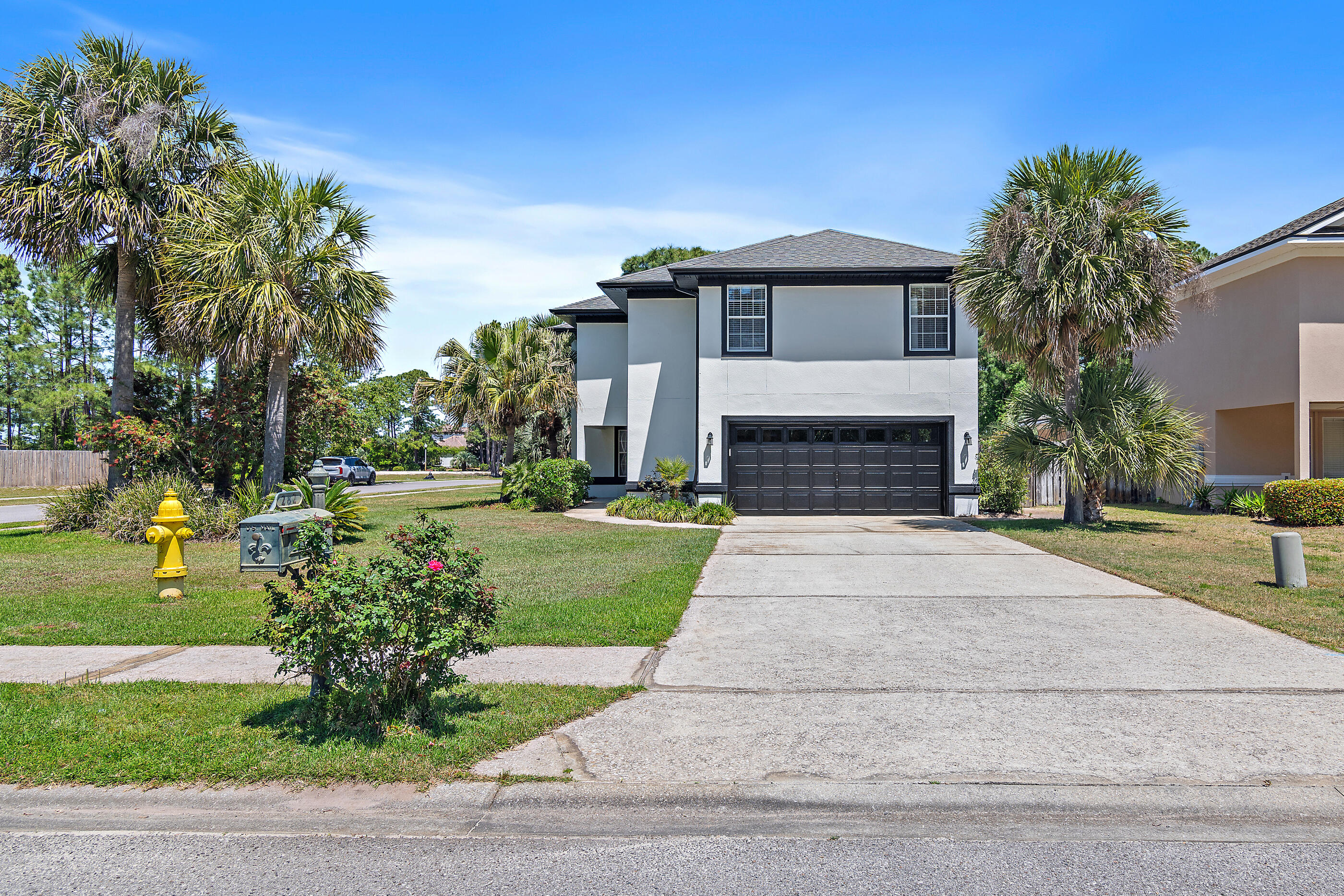 Location, location, location. Beautifully updated private home in Driftwood Estates with lanai covered heated pool! Call now for more information and to schedule a private showing. Coastal living in the coveted neighborhood of Driftwood Estates. This beautiful 4 bed 3 bath heated pool covered by an extra-large lanai home is move in ready. With partial Choctawhatchee Bay views this stunning home sits on an ultra private large corner lot and backs up to a pond for the ultimate privacy and relaxation.
As soon as you arrive at this gorgeous property you will be met with a freshly painted exterior (April 2025), lush, tropical, meticulous maintained landscaping and exceptional privacy.
Upon entering the home, the soaring great room with vinyl plank flooring opens up to the kitchen with updated back splash, stainless steel appliances, dining area with vinyl plank flooring, a ground floor bathroom, and a bedroom with a walk in closet.
There is an impressive custom loft perched atop the great room adding an additional 205 square feet perfect for the installation of a video projector, use as a workout area, home office, or a picture perfect sitting area to enjoy the partial Bay views with your morning coffee.
Off the kitchen walk through the French doors into your very own private backyard entertaining heaven. The oversized screened in lanai covers a large black tiled, natural gas heated pool with waterfall, (pool heater replaced in 2024), it also covers the brick paved entertainment area perfect for family get togethers, parties, barbeques, or just taking a peaceful dip in the pool and sunbathing. This home is synonymous with relaxation, the backyard oasis provides a true escape anchored by the fully covered oversized heated pool for year round use, large sunning deck which is surrounded by stucco walls promoting the utmost in privacy. The lanai has its own set of French doors leading into the fenced in backyard perfect for pets, gardening or extra storage.
The screens on the oversized lanai as well as the entire roof of the home were replaced in 2022.
This home is equipped with natural gas to create your own amazing outdoor kitchen within the large, covered lanai. In addition, you can convert the electric water heater to a natural gas instant hot water heater and convert the kitchen range to natural gas.
Upstairs you will find two generously sized bedrooms, with walk-in closets. A full bathroom is conveniently located between the two guest bedrooms. The large primary bedroom offers spectacular sunset views, partial bay views and comes fully equipped with a full five piece ensuite bathroom which includes dual vanity, large, jetted bathtub, separate shower, and spacious walk in closet. On the opposite side of the large primary bedroom, you will enter your custom loft where more partial Bay views await. Schedule your private showing today before it's gone.
The two car garage has an extra storage area and a door which leads to additional under stairs storage space. The garage has a man door leading to the back yard which is fenced in perfect for pets, additional storage and gardening.
This incredible home is minutes from the pure white sugar sands of the Emerald Coast, a short walk or bike ride to the Bay.
Driftwood Estates has a wonderful 11-acre park with a community room and pool which regularly hosts water aerobics, mat class workouts, food trucks, basketball courts, grills, multi-purpose fields, tennis courts, pickle ball courts, picnic pavilions, a sand filled playground, restrooms, and nature trails. Minutes away is Sacred Heart Hospital, Grand Boulevard with fine dining, shopping and family entertainment. Sandestin's Village of Baytowne Wharf is also close to this home where more shopping, dining, fireworks, drone shows, concerts and fun family activities are regularly held. Imagine yourself in this breathtaking Emerald Coast lifestyle. This is Florida living at its best call today for more information and to set up your private showing.
All information and measurements are deemed accurate but should be verified by the buyer.