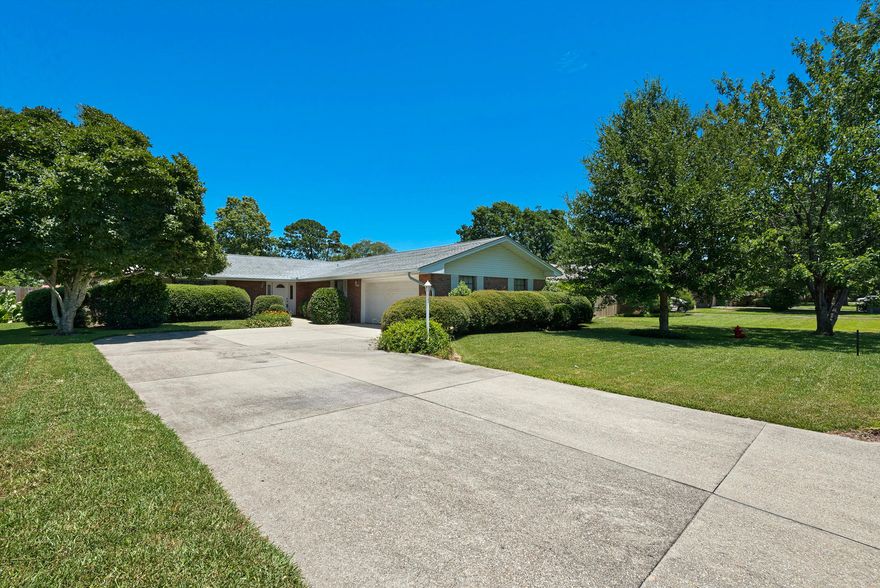 You'll make lots of excuses to stay home and enjoy your home in this spacious 4 bedroom/ 2 bathroom brick home in the quiet Lake Lorraine neighborhood of Shalimar. There are gorgeously landscaped gardens with the perfect proportion of shade and sunshine, and generous space for entertaining guests. Just when you thought it couldn't get any nicer, the inside features a split-bedroom floor plan with many special amenities including: a wood-burning brick fireplace;low utilities cost; beautiful Granite countertops; an eat-in updated kitchen; spacious bedrooms; a living room, dining room and family room and a two car garage.