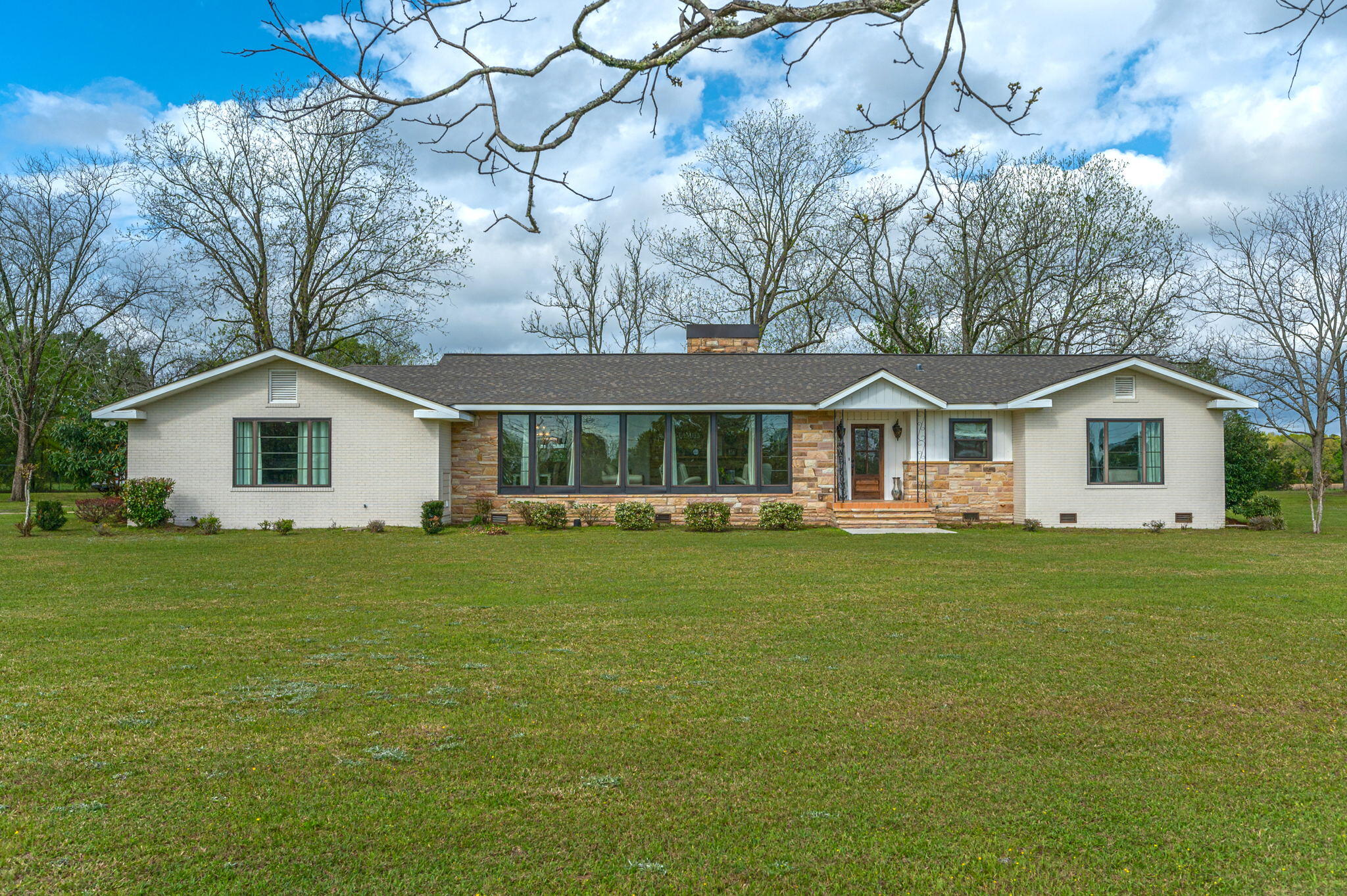 Looking for the perfect home on 5 acres then look no more! This home offers EVERYTHING you want! Home was upgraded in 2017 to include new roof and HVAC just to name 2 of the most important items as well as the kitchen to include a fantastic Viking stove! Home offers a large foyer that welcomes you to the living room with amazing windows and views along with a formal dining and amazing double gas fireplace. Home has a large updated kitchen with tons of cabinets, top of the line appliances, and eat in kitchen along with wall full of storage! Home offers a bonus room with tons of built ins and could easily be converted to a additional master suite. The laundry is perfect access from outside with 1/2 bath. The home has a large screened in back porch, a open air barn and enclosed barn.