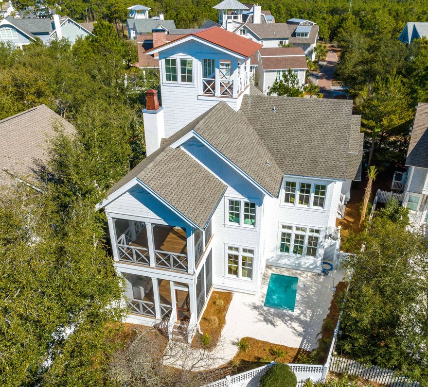 RARE NEW CONSTRUCTION home available in WaterSound Beach! Located in the premier Peninsula district, find refined spaces defined by exquisite design and impeccable construction at this stunning property with 3,300 square feet of interior space and over 600 square feet of covered porches including a tower with beautiful views across the community and the Gulf of Mexico. Luxury finishes masterfully incorporated throughout include Venetian plaster, shiplap, and coffered ceilings, intricate tile accents, hardwood floors, wainscot walls, and custom built-ins. On the first level, the welcoming and spacious living and dining area is centered around a gas fireplace and filled with abundant natural light. The gourmet kitchen features a large quartz center island, Wolf and Sub-Zero appliances and a beautiful tile backsplash with subtle gold accents. A junior master suite with a lovely ensuite bath, a stylish powder room, and a laundry room are also located on the first level. A spacious screened porch with summer kitchen accessed through the living area allows an extended gathering space and a heated pool with paver patio offers the perfect place to cool off on a warm sunny day. An elevator provides added convenience to the higher floors. Upstairs, find a secondary living space along with two guest suites with ensuite bathrooms, the main laundry room, and the primary master suite. With a private screened porch, a spa-like master ensuite, and coffered ceilings with Venetian plaster insets, this bedroom is truly a serene retreat. The third level offers four built-in bunks, a sitting area, breakfast bar and full bath. The open-air tower offers panoramic views. A two-car garage provides the storage needed for all the accoutrements of beach life. The thoughtful design of this property makes it well suited to be a full time residence or a second home. A must see to fully appreciate the intricacy and beauty of the both the design and finishes!

Sophisticated and stylish, the gated WaterSound Beach community is located south of Scenic Highway 30A offering homeowners a rare sense of seclusion yet with easy access to area activities. Amenities include swimming pools, a puttering park, community green spaces, a state-of-the-art fitness center, and private boardwalks to one of the most beautiful mile stretches of coastline in the area. 
