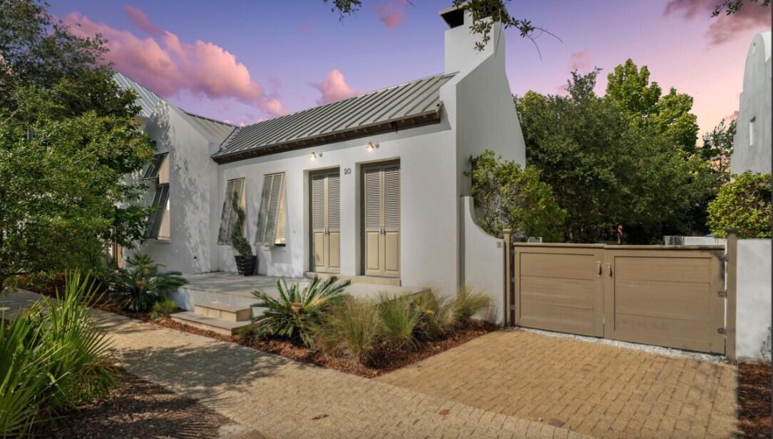 When someone says a ''house is a unicorn,'' it means they are describing a home that is considered nearly impossible to find, with perfect features, qualities, and development  possibilities that it's essentially mythical like a unicorn.  You will love the open floor plan!  Stained concrete floors, vaulted ceilings, quartz counter tops.  A full chef's kitchen with stainless and solid surfaces .  Just down the hallway is the Primary Suite with a King bed which includes a totally renovated Primary bathroom.(new pictures coming soon) There is a large walk-in closet. The other two spacious guest bedrooms have Queen beds.   Wake up in any of these bedrooms to the warming sunlight draping in from your adjoining doors that leads you out to the beautiful courtyard.  Another full bathroom sits  between the two bedrooms and the adorable twin bunk-bed located in the main hallway. Outside the cottage is 821 sf of relaxing outdoor living area and covered porch and loggia. The home is directly across from the Owner's Pavilion.  
Based upon the information reviewed by Town Architect it appears that there is 811 SF remaining that could be constructed as impervious and result in in the allowed 50% impervious coverage.  Add a carriage house and/or pool.  On expanding the house footprint, the Urban regulations limits the width of the house wings to 25'.  Enlarging the footprint would need to comply with the Urban and Architectural Regulations adding a second story to the house.  Any house on the Type IX House/Lot type is allowed to be two stories.  


