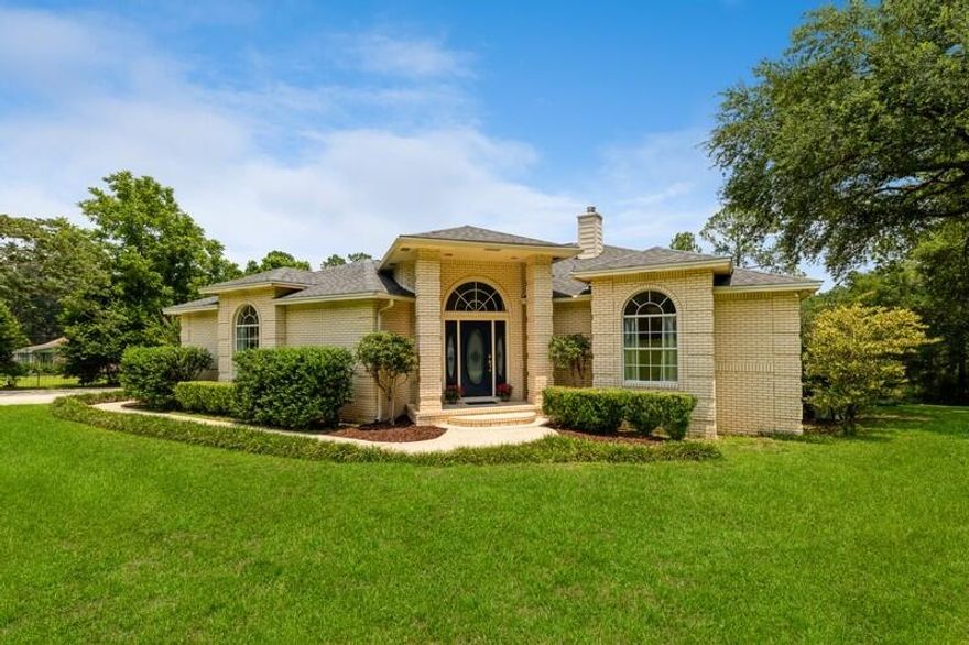 Relaxation AND Fun on 2.6 acres!  At over 2,200 sq ft, this gorgeous custom brick home must be seen; it was designed with comfort, recreation and a touch of elegance in mind.  Beginning in the large entryway, notice the tall ceilings leading to the sunken bonus room with wood-burning stove.  It opens onto a railed back porch with built-ins above the huge deck with a sports pool that look and feel like a day at the beach sunning or playing volleyball, but without the sand!  A poolside storage room holds all of your toys and includes benches for your outdoor hobbies.

Come back in to the the extra-large master suite, a sanctuary with bay window, tongue-and-groove wood ceiling, oversized steam room/shower and a spa tub.  The dining room and kitchen are bright with loads of cabinet space, quartz countertops, a pantry and matching LG smart appliances that include a double oven with convection.   The living room features another wood ceiling, a hard-wood floor, a wood-burning fireplace and built-in cabinetry; it also has a set of stairs leading to poolside.  There is an Energy Star large capacity smart LG washer and matching dryer in the laundry room, and an extra fridge in the garage. 

The front lawn is large enough for sports, and the wood pole barn can hold an RV or a boat and kayaks, or use it for storage-it's already got a cord or two of firewood!  A new roof,  resurfaced pool deck and roadside installation of Fiber Optic Cable for super-fast internet (projected to be available for sign-up in a few weeks!) are already completed.  This tranquil home is minutes away from North Crestview schools, restaurants, businesses and the theater, but the feel of the property is secluded, set way off the road with a back yard that rolls out to nature.