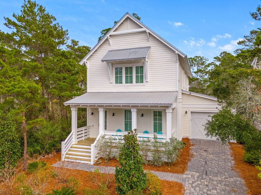 Welcome to your coastal Florida DREAM home! This 5 bedroom, 4.5 bath coastal retreat in Lakeside at Blue Mountain Beach is waiting for you! Upon entering this craftsman style home, you're greeted by tons of natural light - enhancing the open, bright, and airy feel. The first floor consists of 1 of the 3 primary sized bedrooms with ensuite, the open concept kitchen, living, and dining areas, laundry, and a half bath. A chef's dream of a kitchen with beautiful leathered granite countertops, GE Cafe' gas range, kitchen island with breakfast bar overlooking the living and dining areas to keep everyone included in the entertainment. Just off the dining area is a door to the enclosed patio that has an incredible nature view of the trees that line the lake - making a tranquil place to relax. Head upstairs to find the remaining primary suite and owner's suite, each with their own ensuite with tiled walk in showers, leathered granite double vanities, and featuring beautiful natural wood beamed ceilings in the bedrooms. Between those 2 rooms there are 2 bedrooms with a Jack&Jill bathroom. Schedule a showing today!