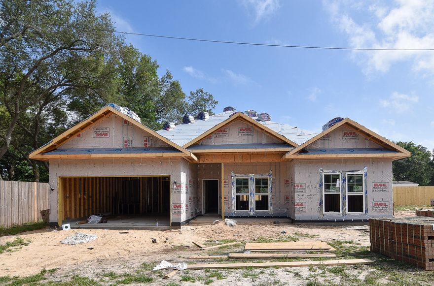 **CHECK OUT 3D VIRTUAL TOUR OF SAME FLOOR PLAN*** Under Construction - can close 7/15/2020! *** VA? MOVE IN WITH NO MONEY DOWN!! Seller will pay all closing costs! Beautiful 4 bedroom 2 bathroom home by a local builder. In the craftsman style, this home offers all the comforts and conveniences of modern living: QUARTZ/GRANITE counter-tops; custom, SOFT-CLOSE, shaker style, all-wood cabinets; SLATE finished GE appliances, large walk-in pantry, and large central island w/ breakfast bar. ALL solid surface flooring throughout helps to make this a low allergen home! This custom home also includes: 9-11' ceilings, CROWN, tray ceiling, and arched walk-thrus.