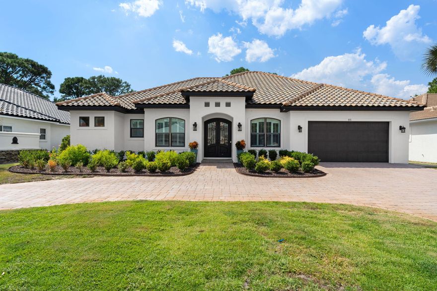 NEW PRICE...FLORIDA LIVING AT IT'S FINEST!!! Located in the Golf Course Community of Emerald Bay sits this UPDATED,  IMMACULATE ONE LEVEL 3 Bedroom with a Den(4th Bedroom) 3 Bath Open Floor Plan Move In Ready Home.  Located on the 17th Hole of The Emerald Bay Golf Course with Bay Views. The Home has a Great Outdoor Living Area with a Large Covered Lanai, Salt Water Pool with Spa Tub, Fireplace and Summer Kitchen. State of the Art  Kitchen with 2 Islands, Butler's Pantry, Farm Sink and Top of the Line Appliances that Opens to the Spacious Living/TV Area. Private Primary Suite has Large His & Her Closets, Walk In  Shower, Separate Tub and Double Vanity.